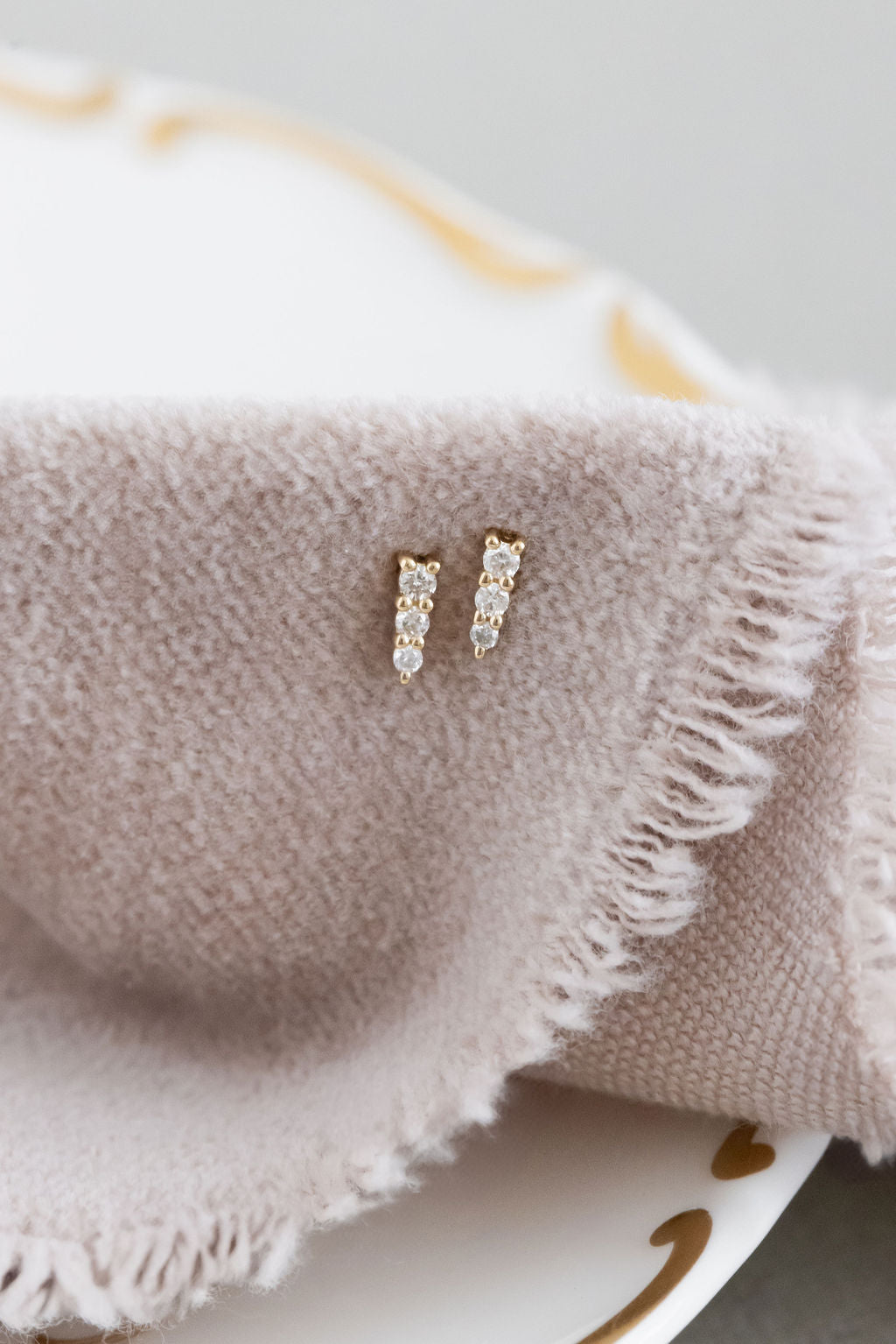 Three Tapered Diamond Stud Earrings