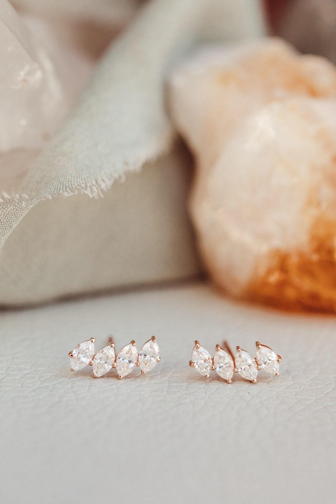 Four Marquise Diamond Curved Stud Earrings