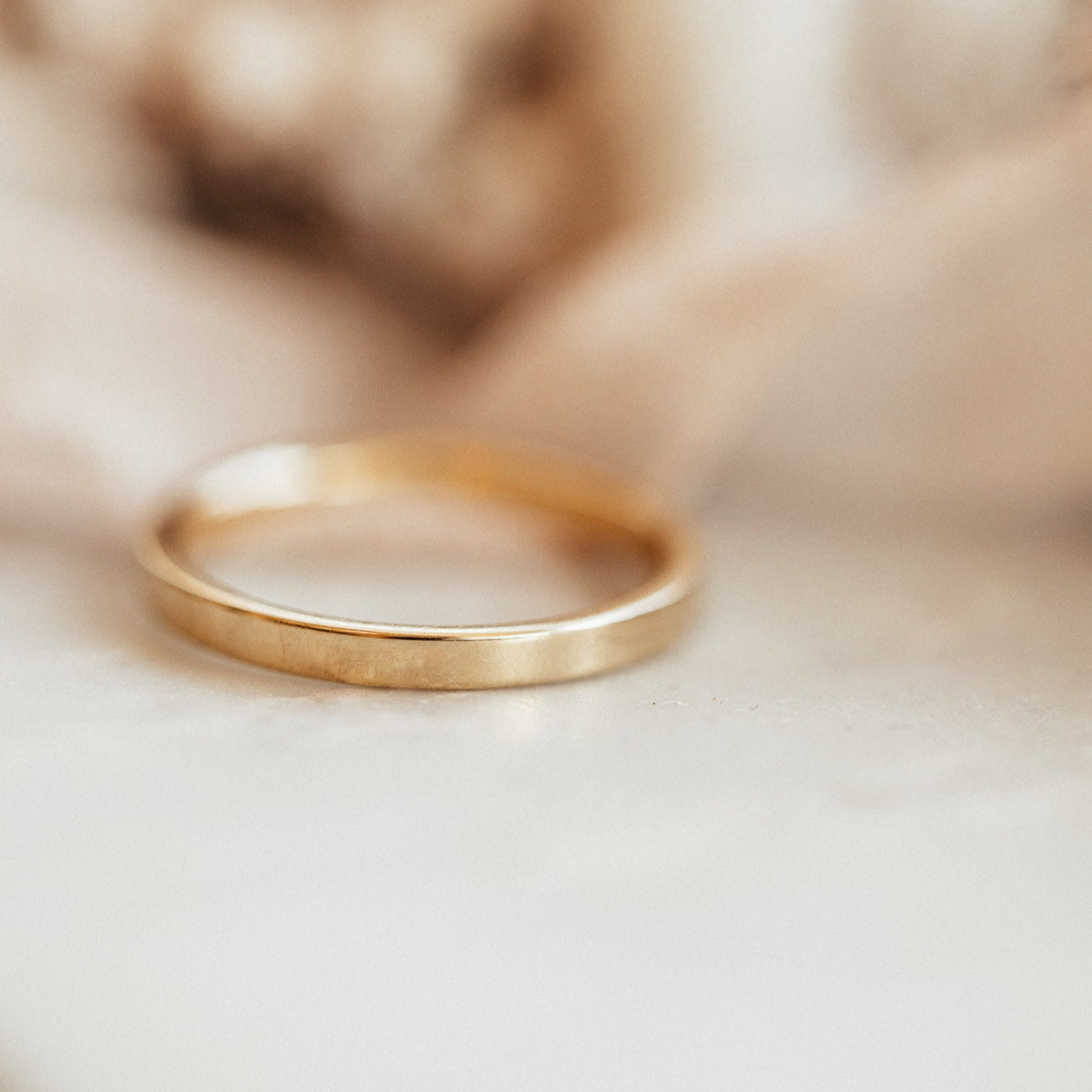 The Thin Gold Stacker Band in 14k yellow gold