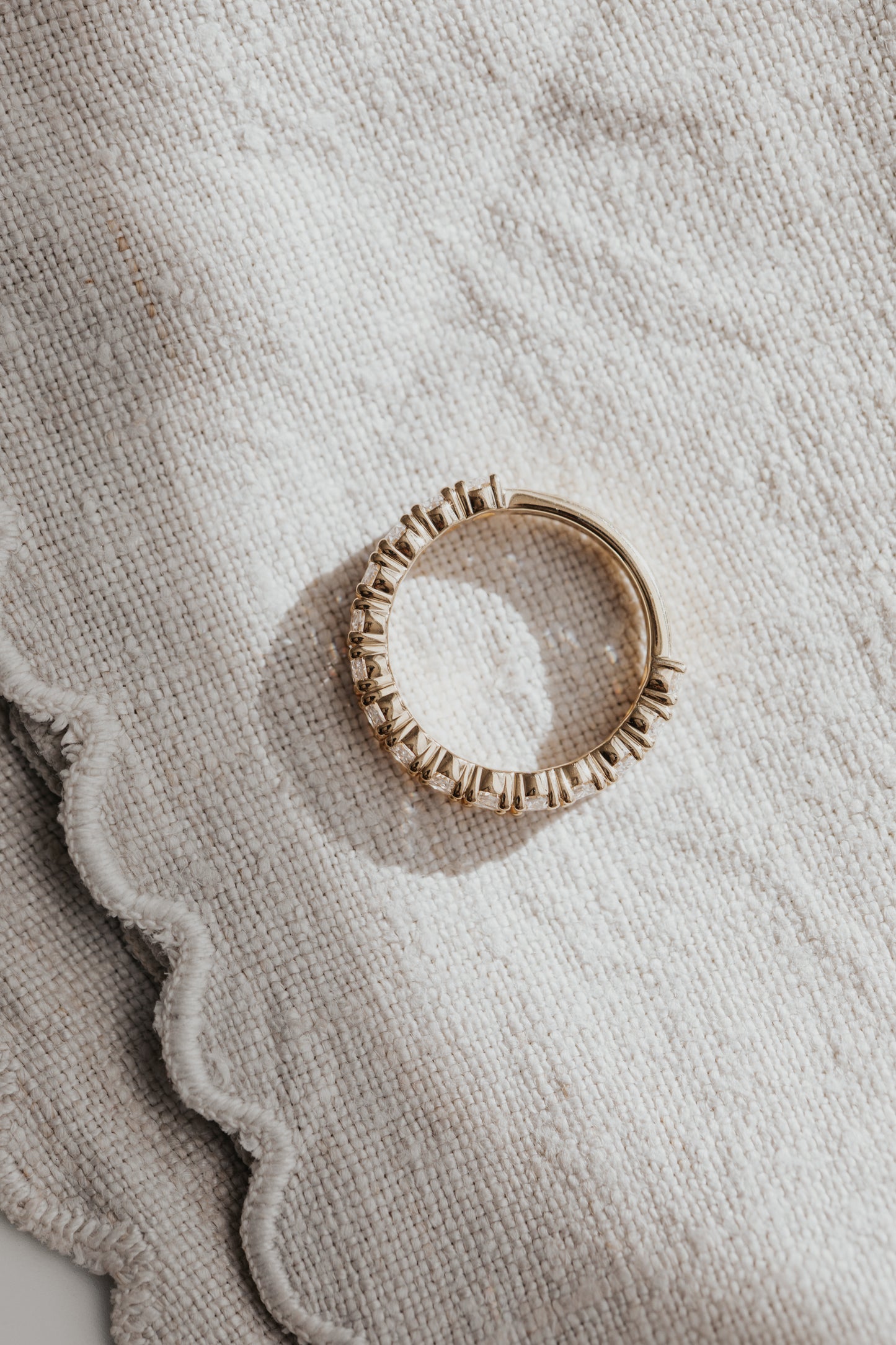 The Amara Oval 3/4 Diamond Band aerial view