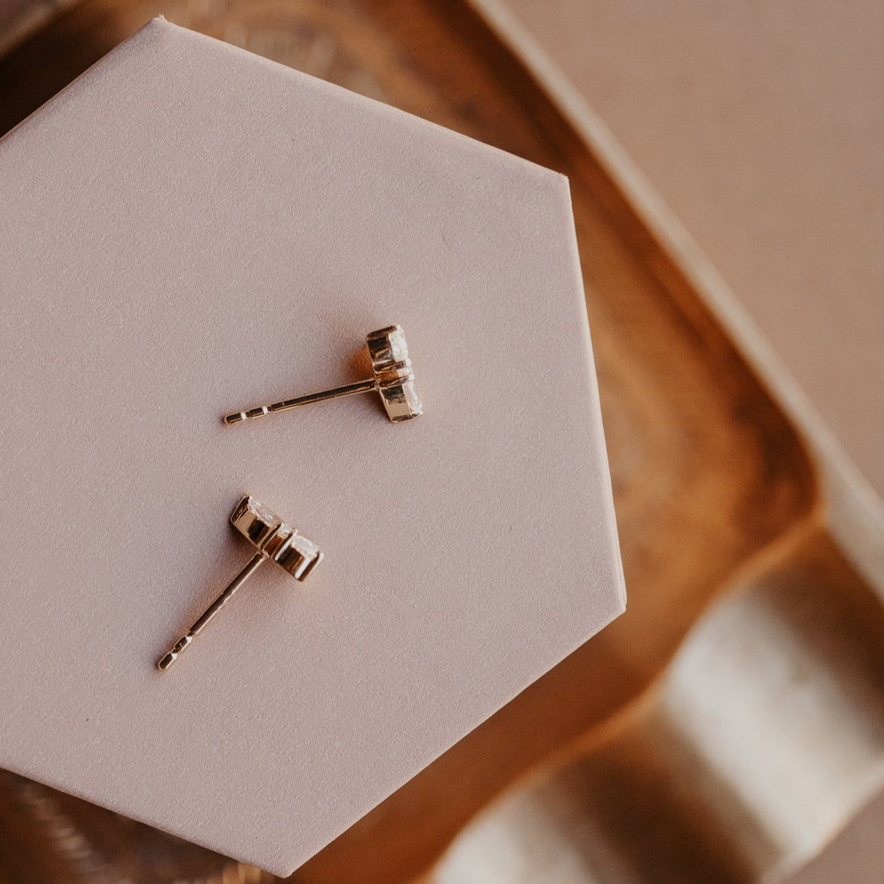 Friction backs of the Two Pear Diamond Stud Earrings