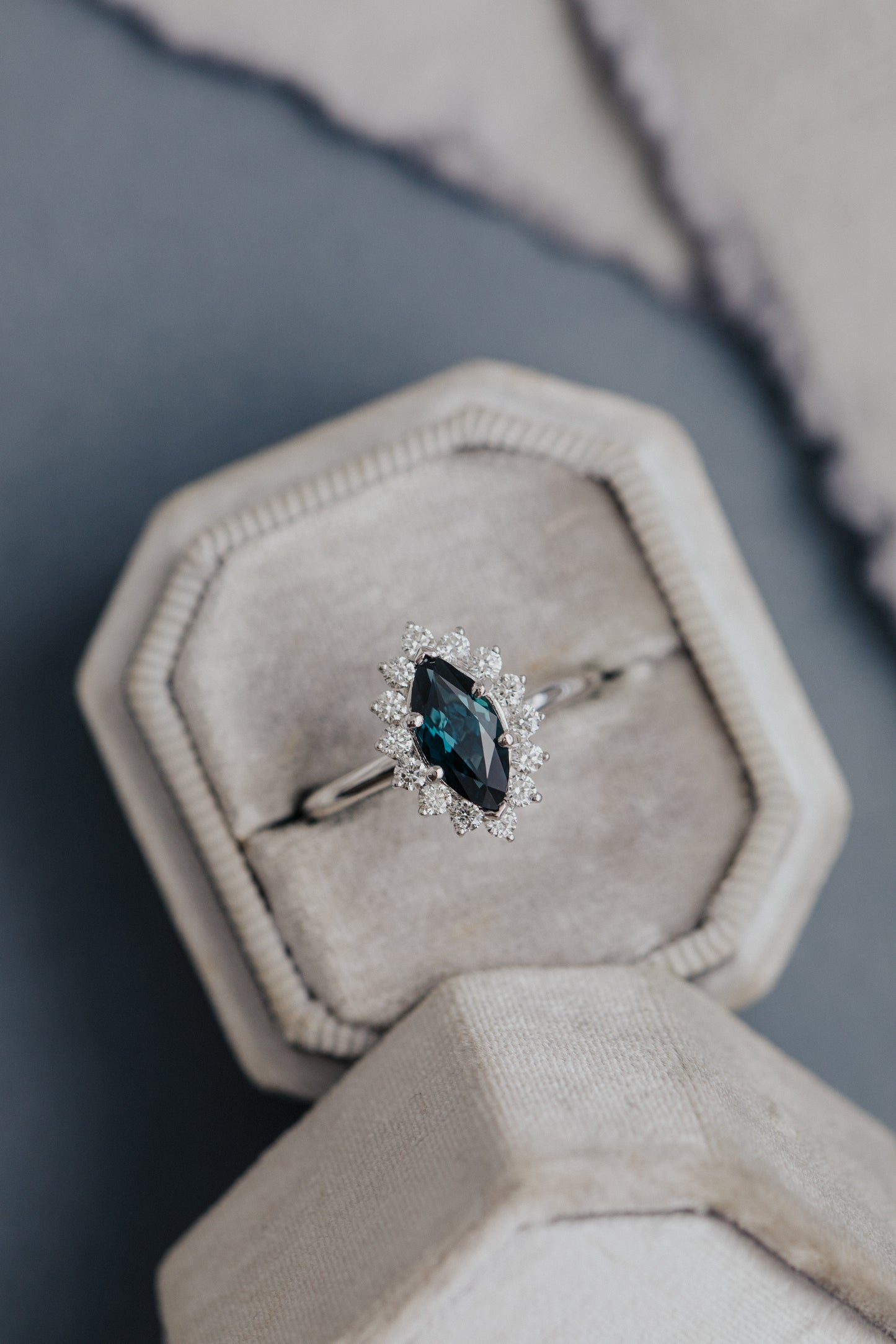 The Nova 1.09 ct Marquise Blue Sapphire Engagement Ring in a Sarah O Jewelry velvet ring box