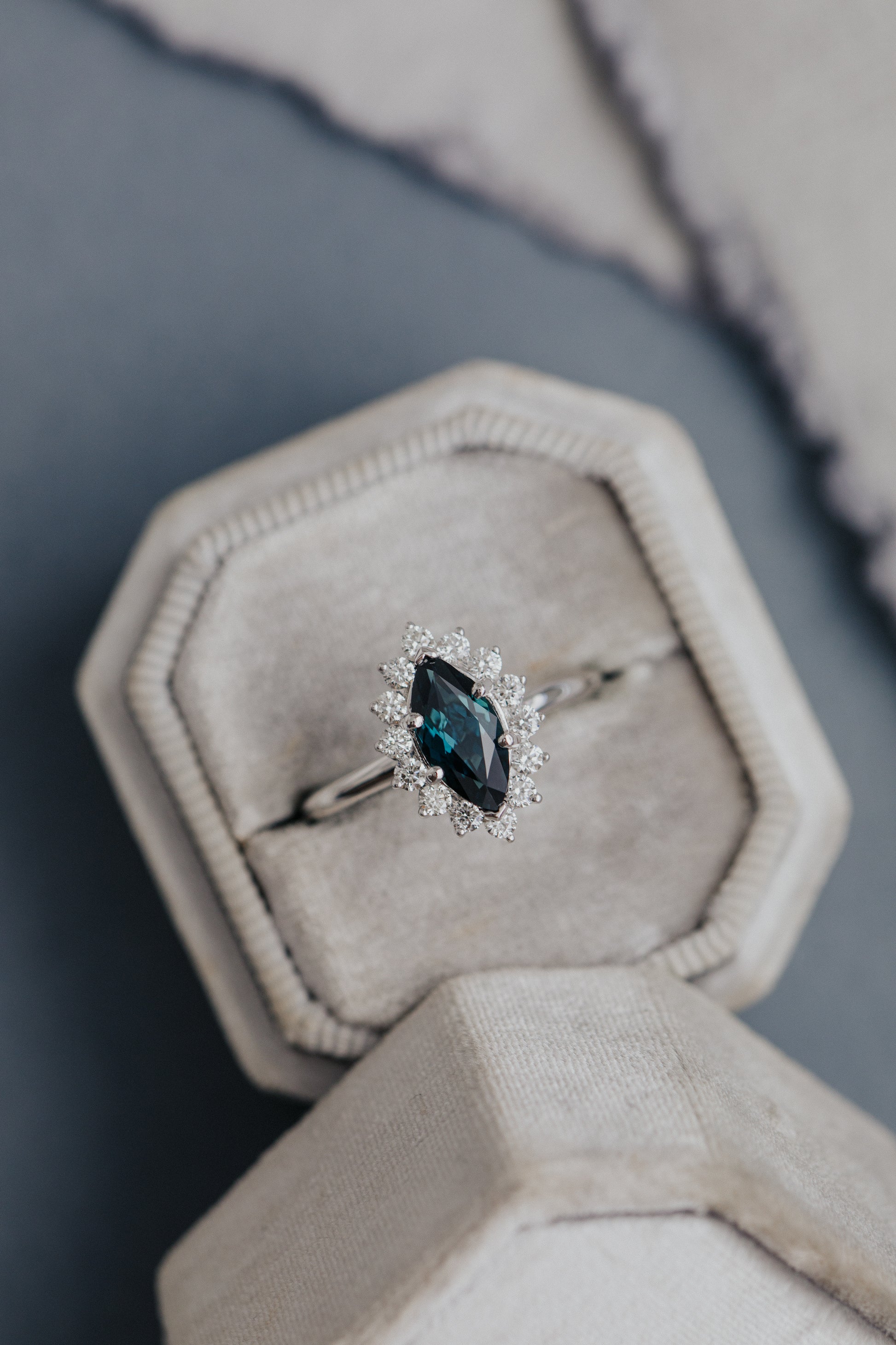 The Nova 1.09 ct Marquise Blue Sapphire Engagement Ring in a Sarah O Jewelry velvet ring box