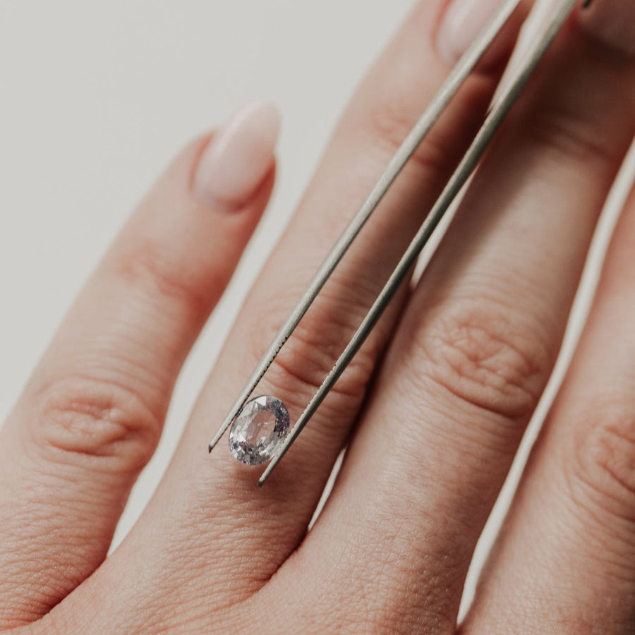 1.21 ct Oval Purple Sapphire Stone on models hand