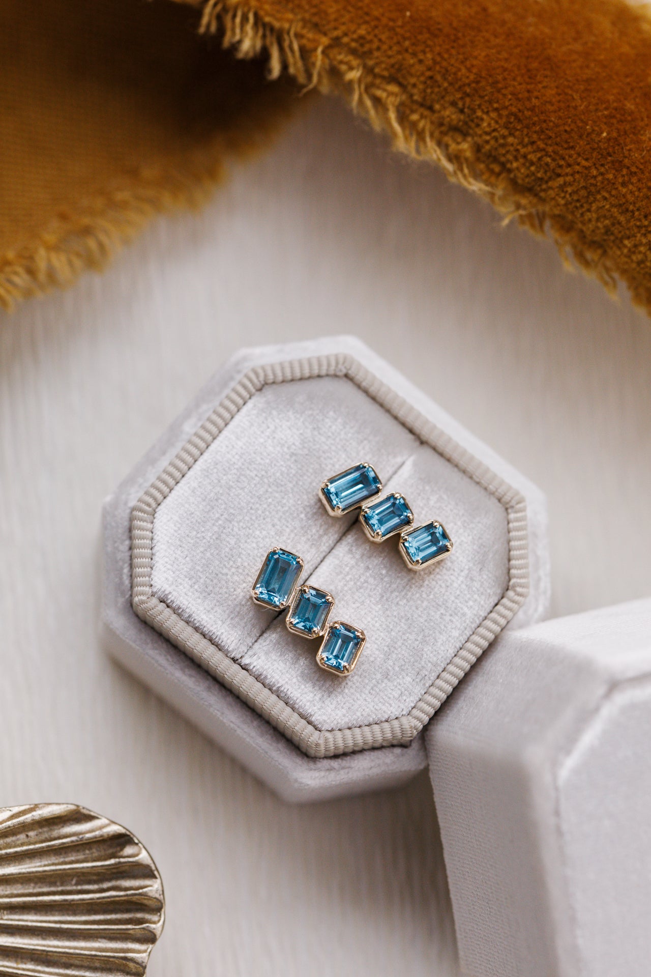 Emerald Cut Blue Topaz Climber Stud Earrings