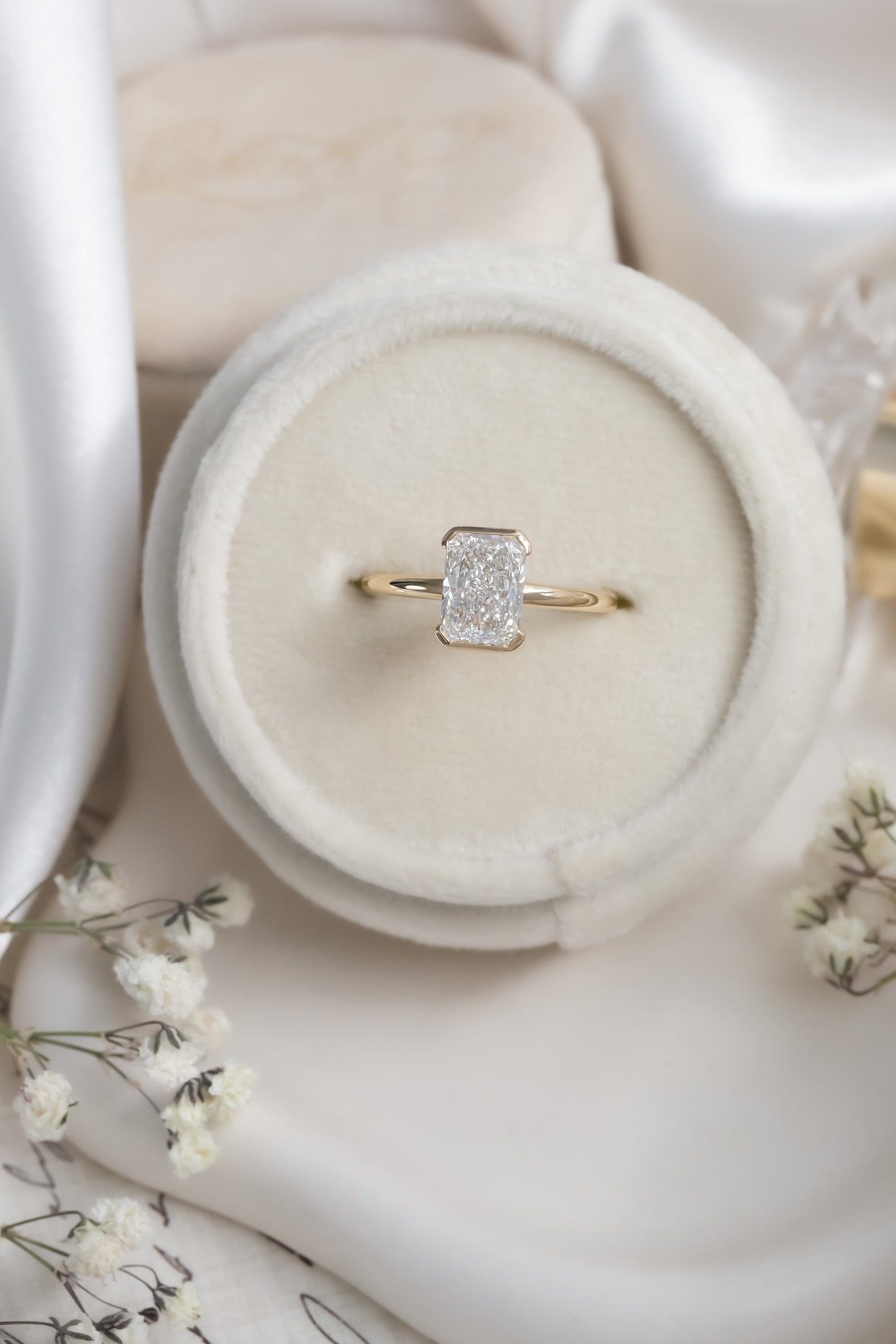 The Zadie Radiant Cut Half Bezel Solitaire Ring