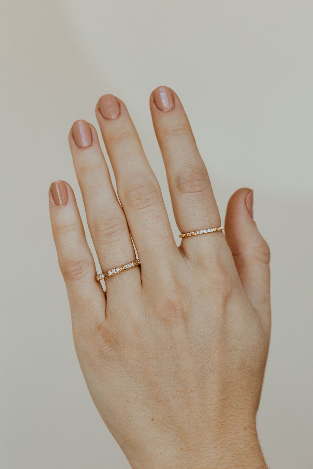 The Jane Diamond Band on a models hand