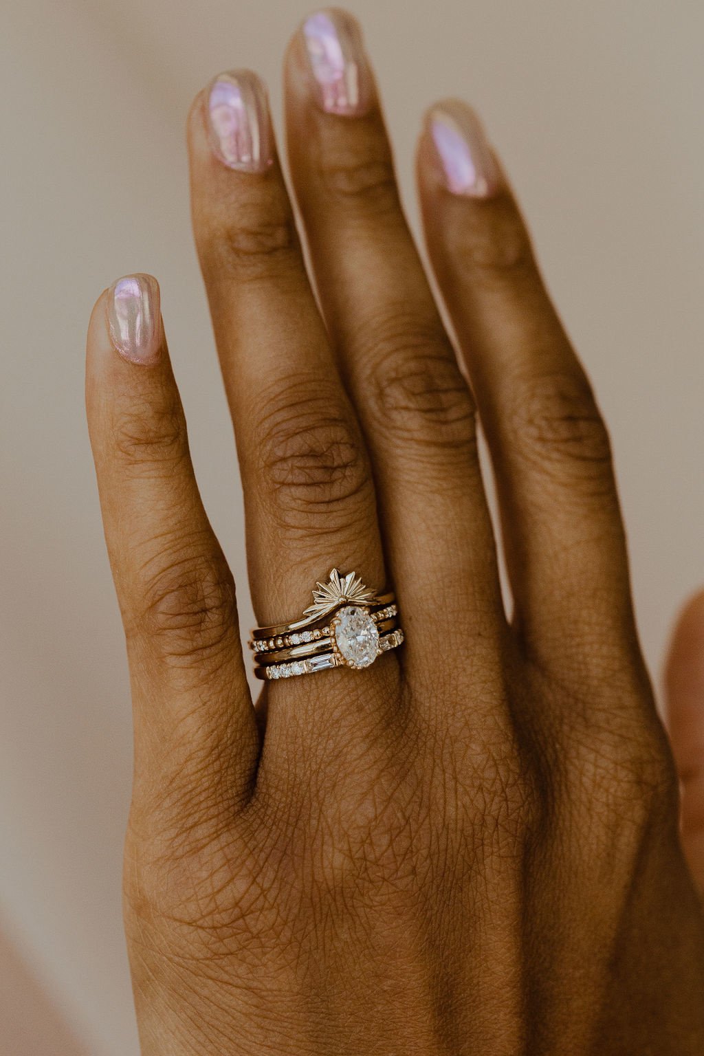 The Jackie Diamond Band on a models hand