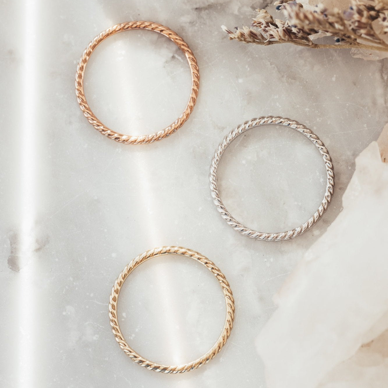 The Skinny Rope band in 14k rose, white, and yellow gold.