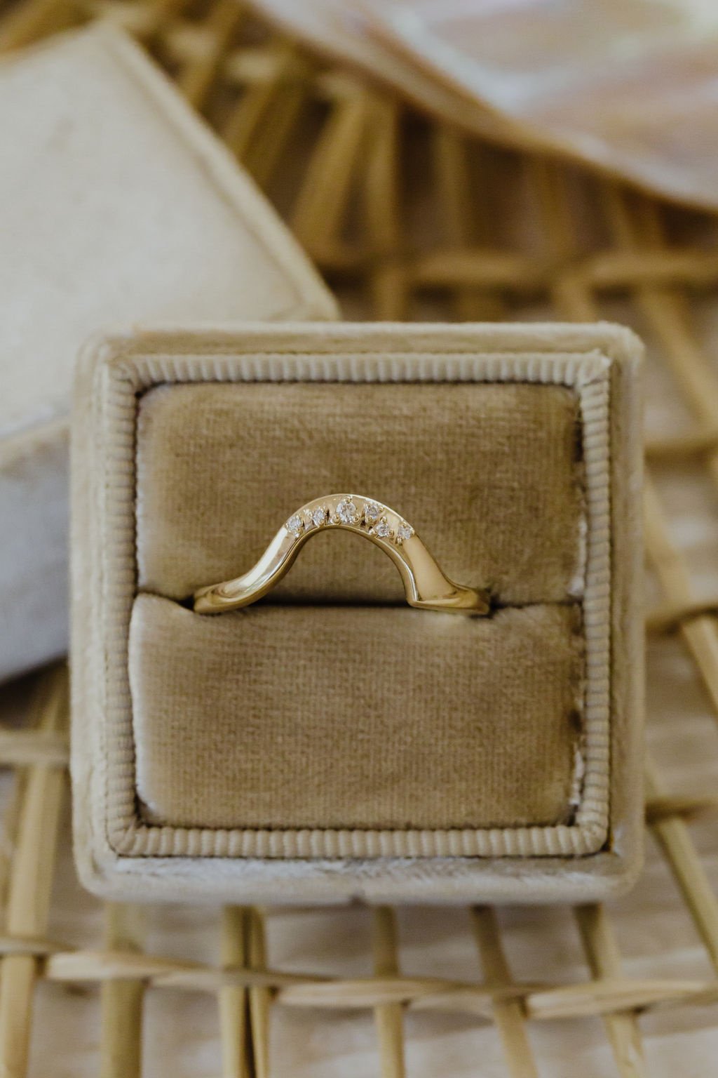 The Horizon Round Band in a Sarah O Jewelry velvet ring box