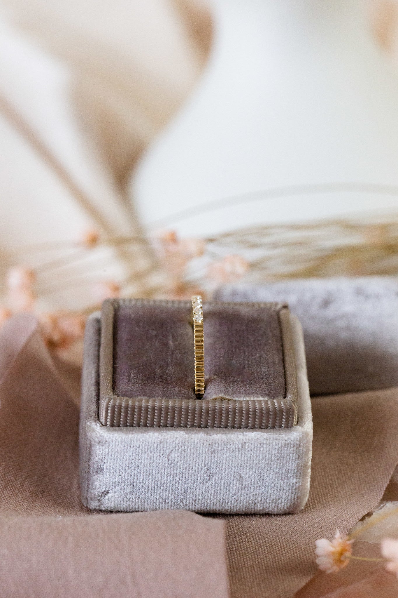 Profile view of The Jane Diamond Band in 14k yellow gold