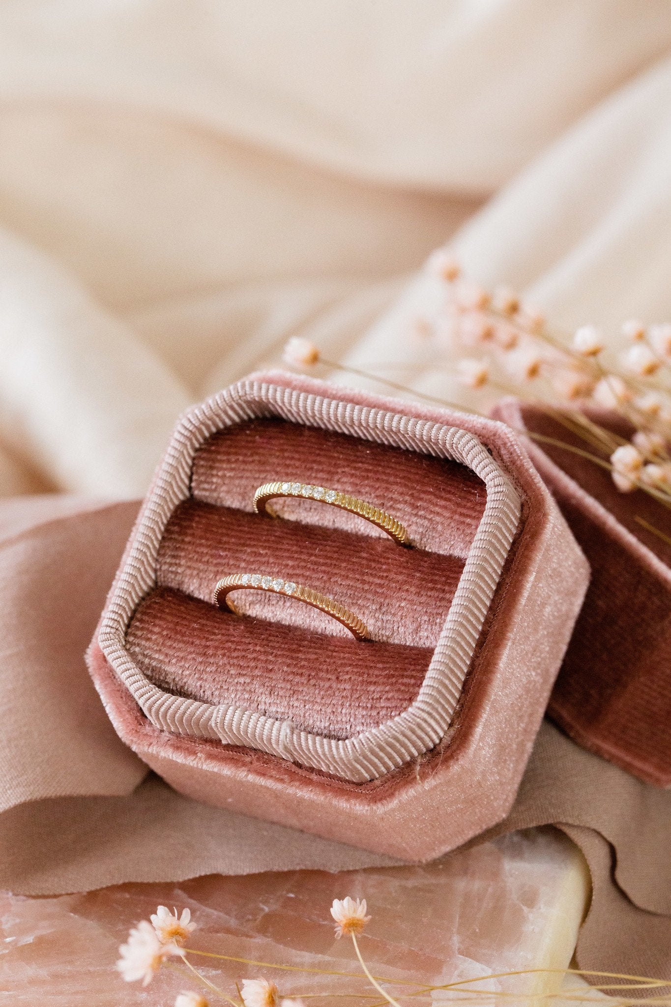 The Jane Diamond Band in 14k yellow and rose gold in a Sarah O Jewelry velvet ring box