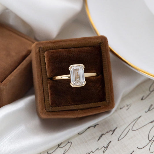 The Zadie emerald cut engagement ring in 14k yellow gold