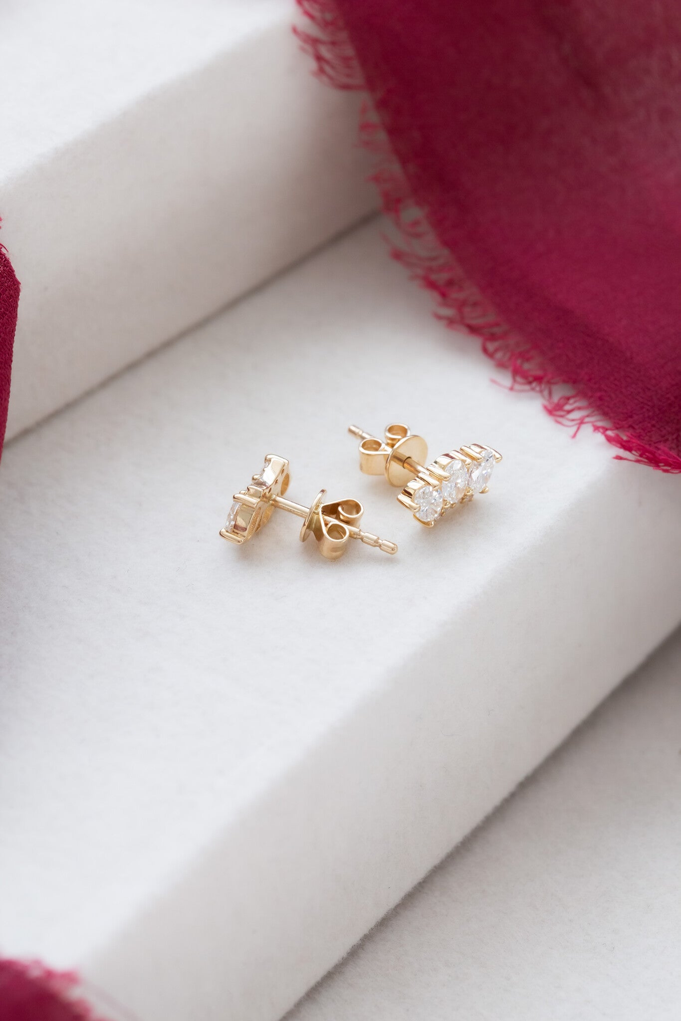 Three Oval Diamonds with Curved Diamond Bar Earrings