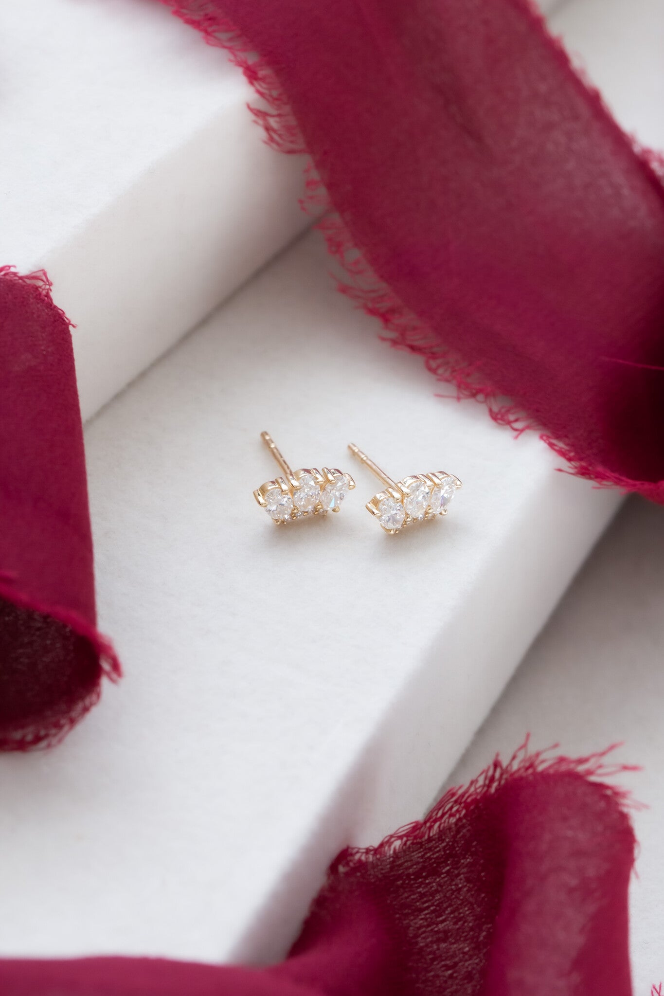 Three Oval Diamonds with Curved Diamond Bar Earrings