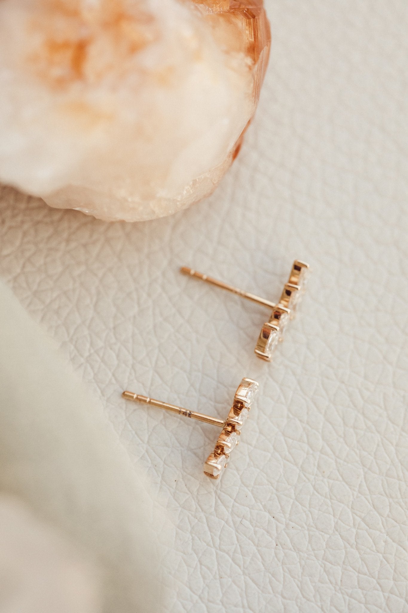 Four Marquise Diamond Curved Stud Earrings