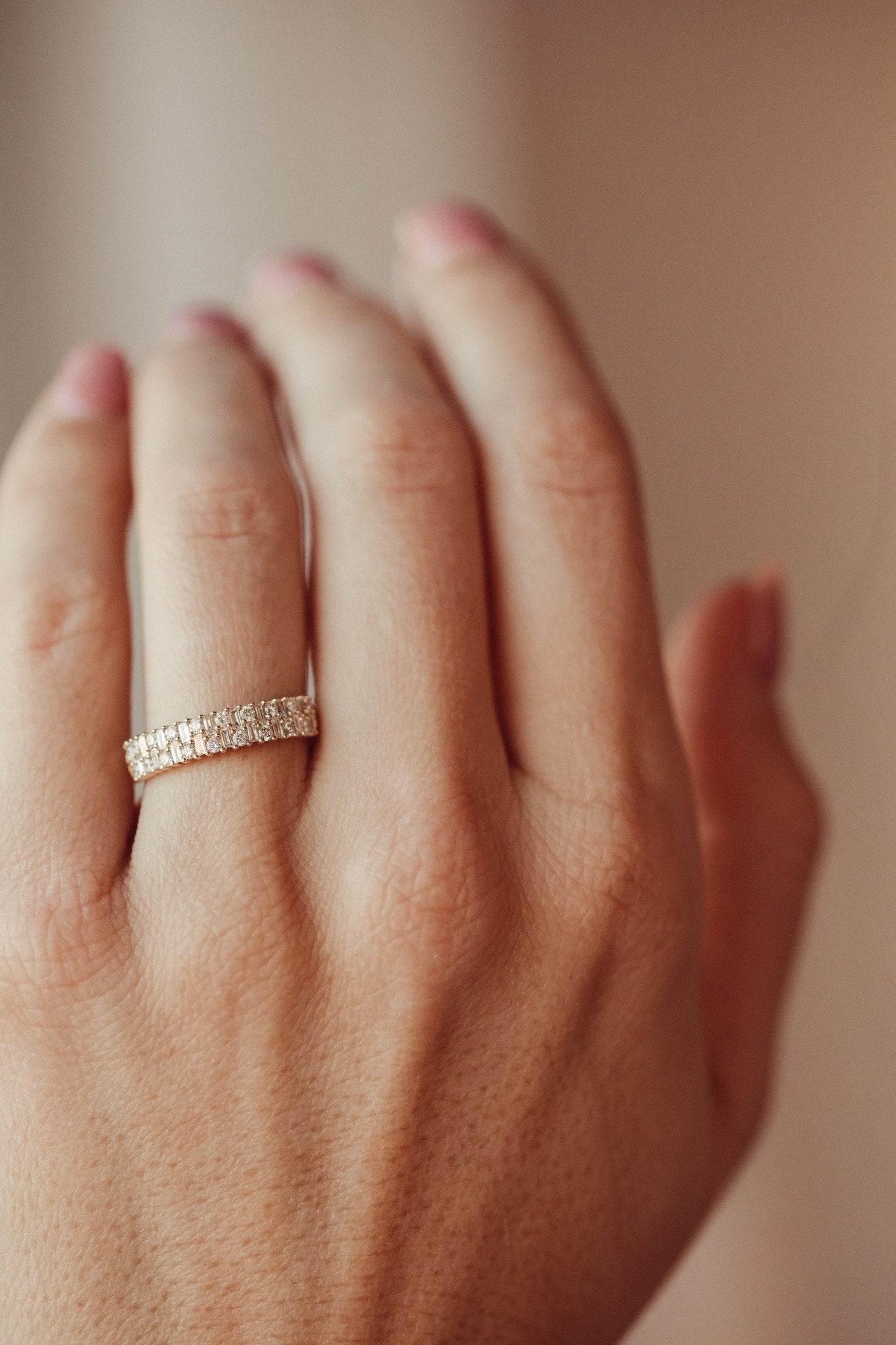 The Clarissa Band on a models hand