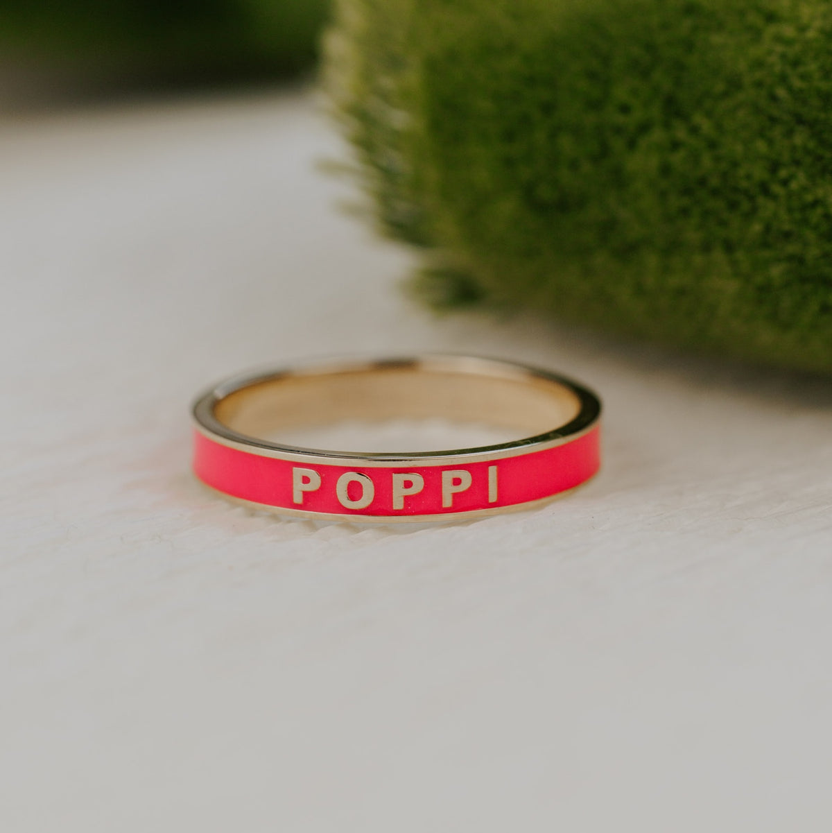 Hot pink customizable enamel gold band.