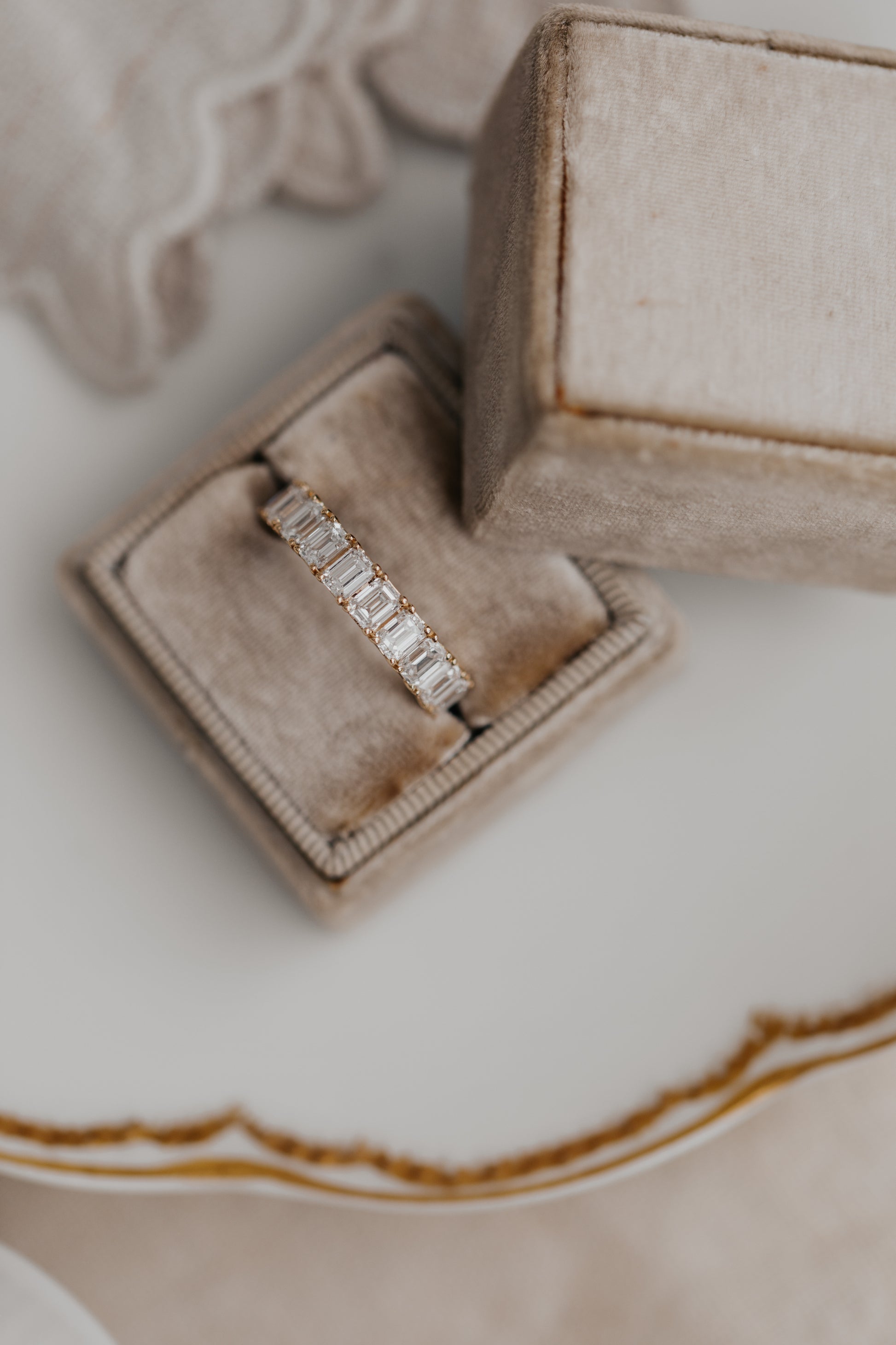 The Amara Emerald Cut Full Eternity Diamond Band in a Sarah O Jewelry ring box