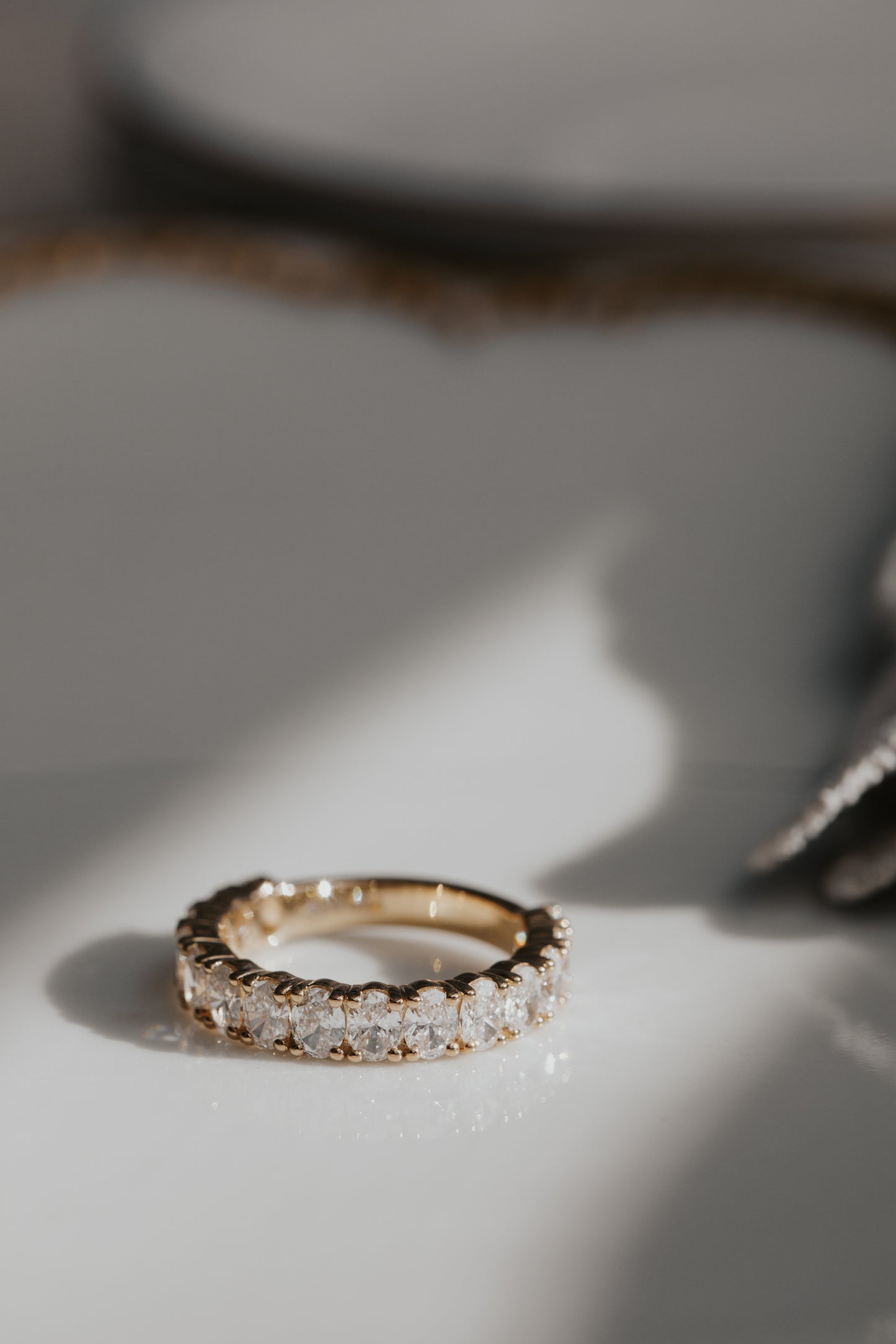 The Amara Oval 3/4 Diamond Band