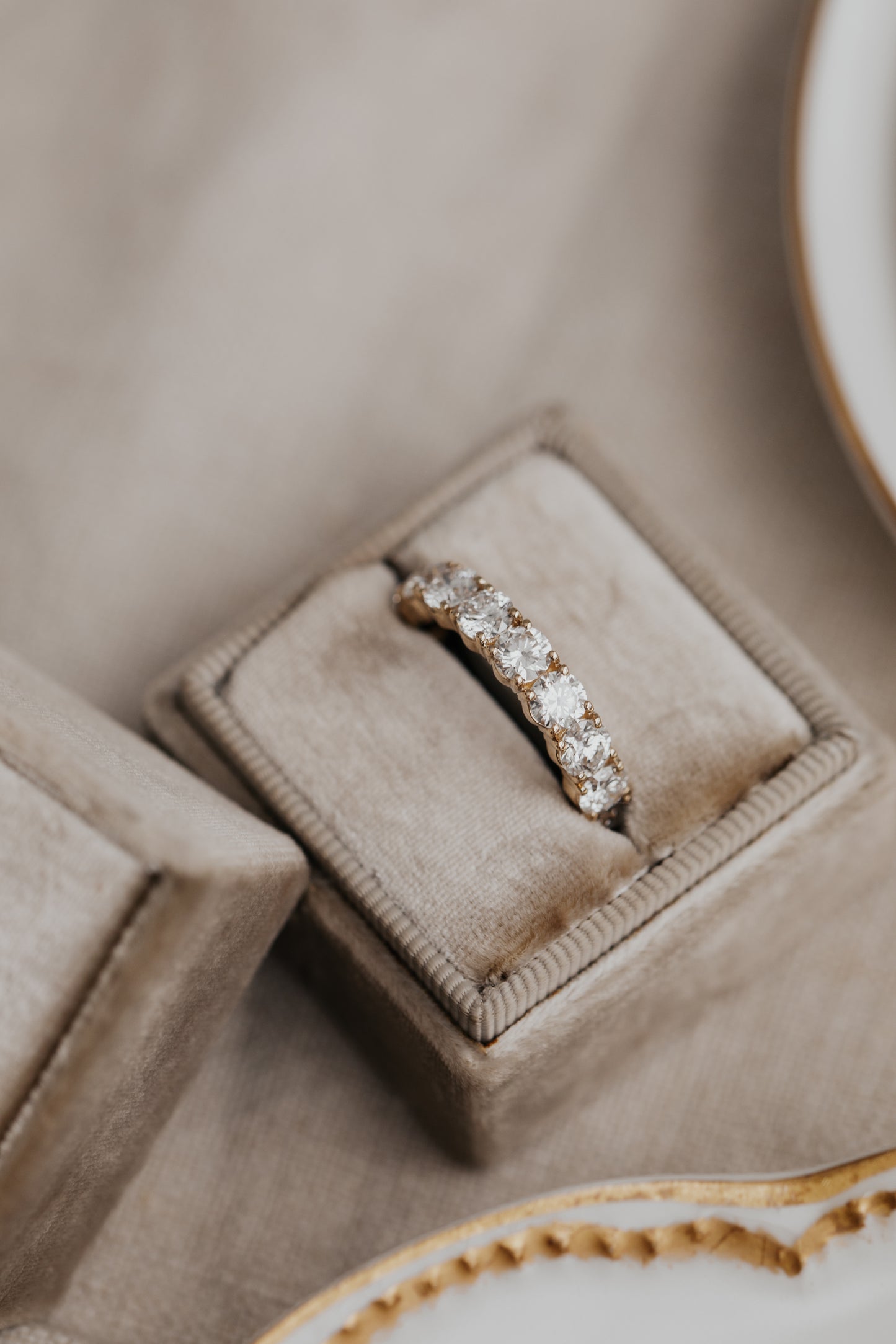 The Amara Round 3/4 Diamond Band in a Sarah O Jewelry ring box