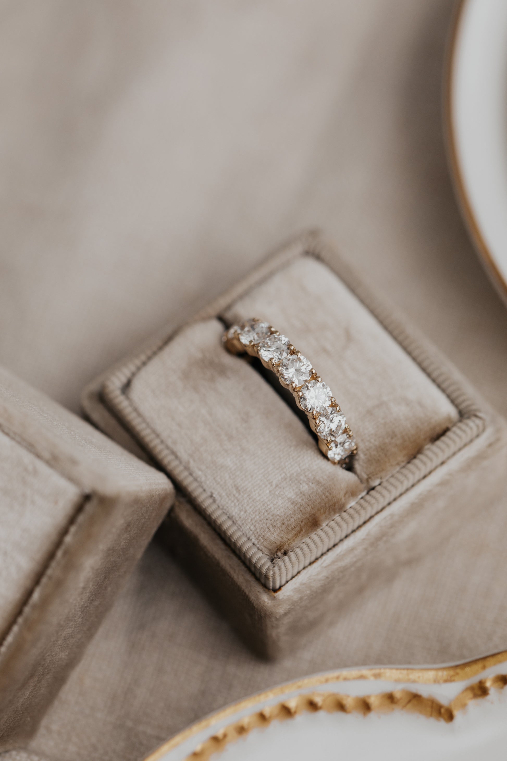 The Amara Round 3/4 Diamond Band in a Sarah O Jewelry ring box