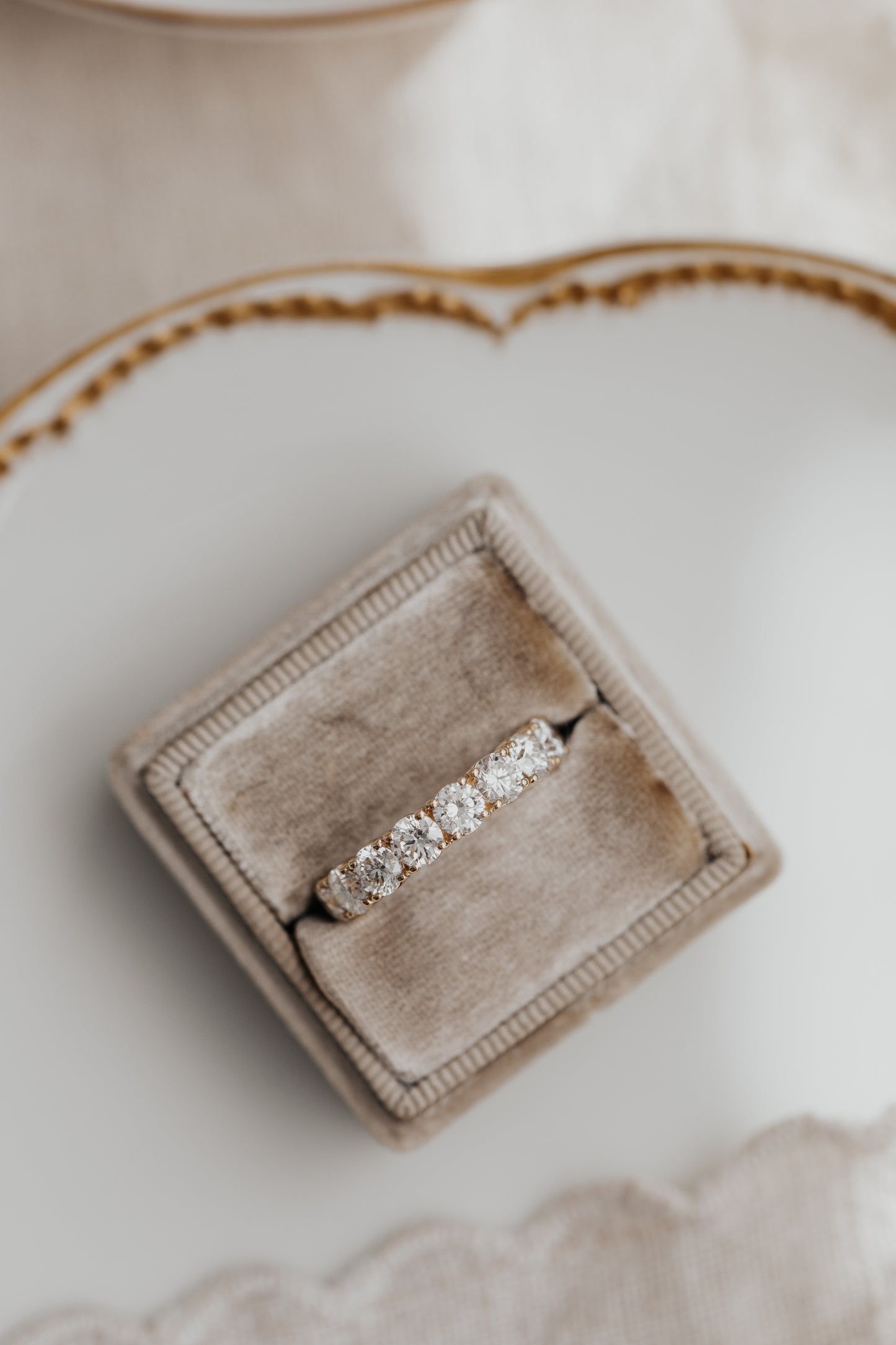 The Amara Round 3/4 Diamond Band in a Sarah O Jewelry ring box