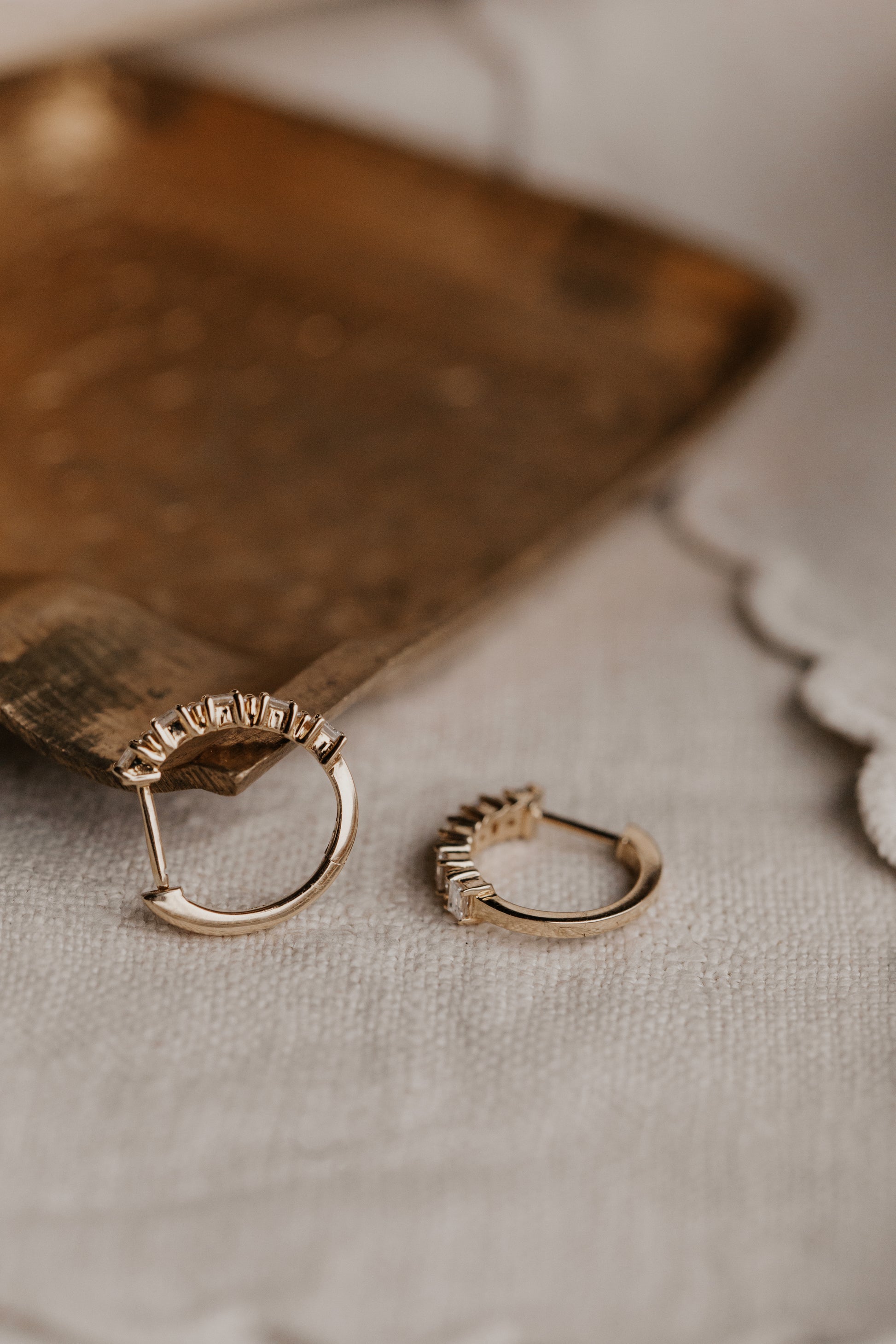 Baguette and Round Diamond Huggie Earrings with a hinged clasp design