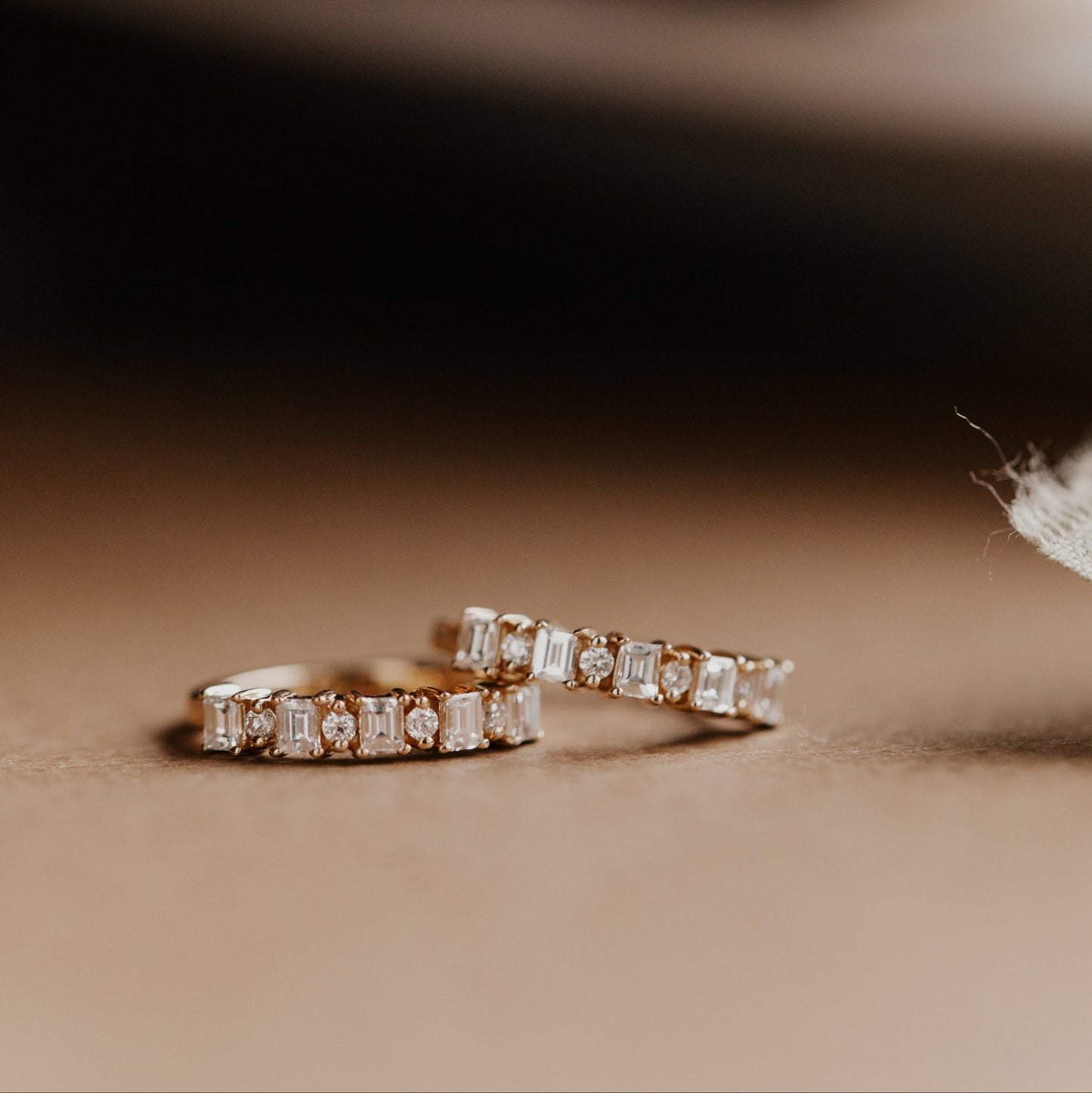 Baguette and Round Diamond Huggie Earrings in 14k gold