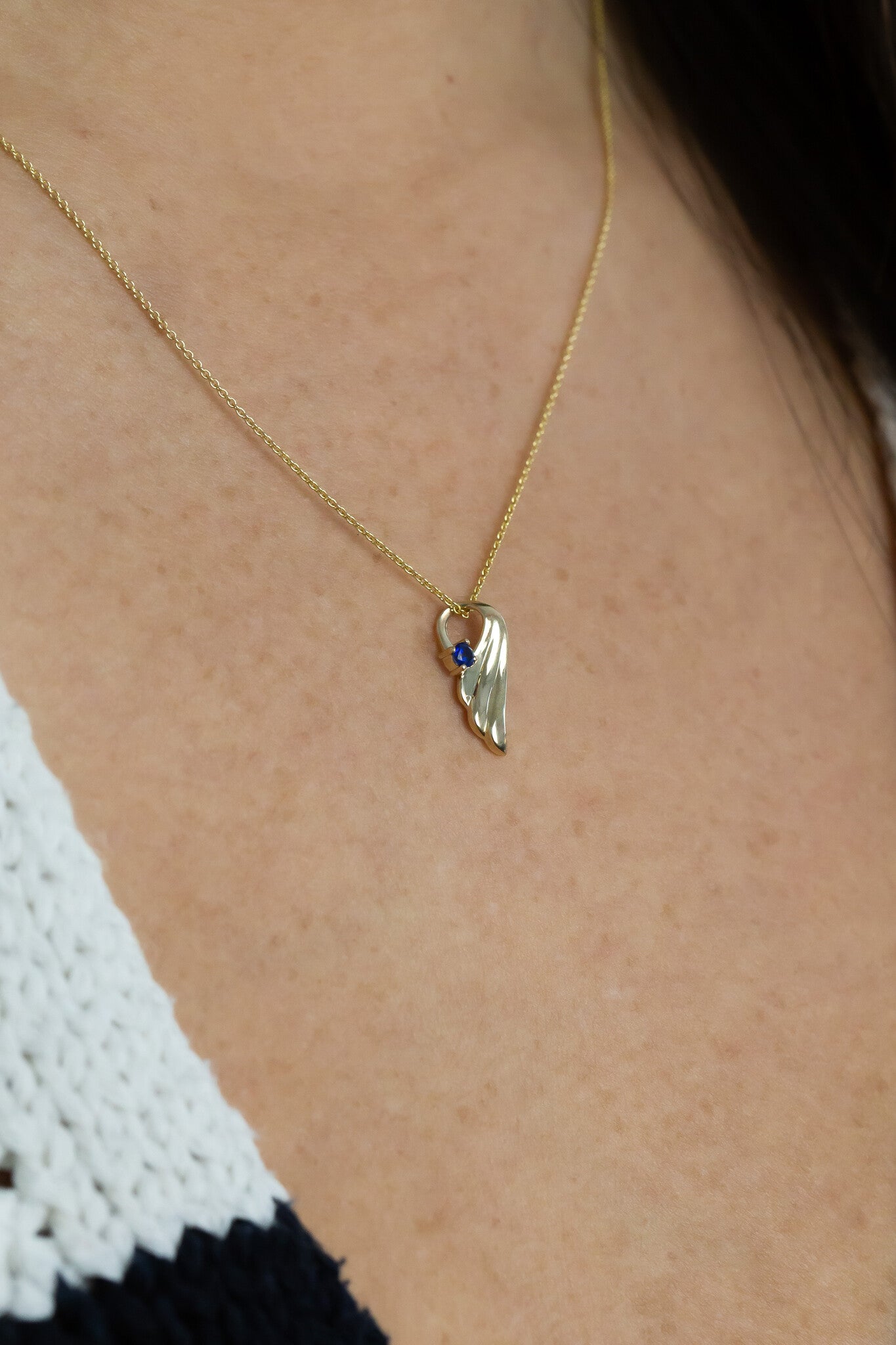  The Beloved Personalized Necklace in Sapphire on models neck