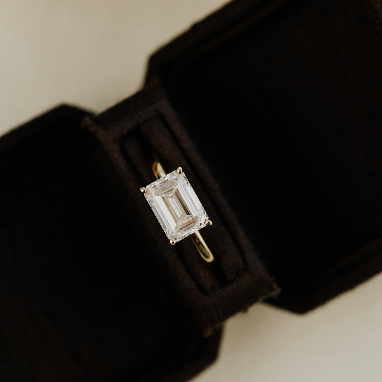 The Bennett 2.52 ct emerald cut lab grown diamond ring in a black jewelry box.