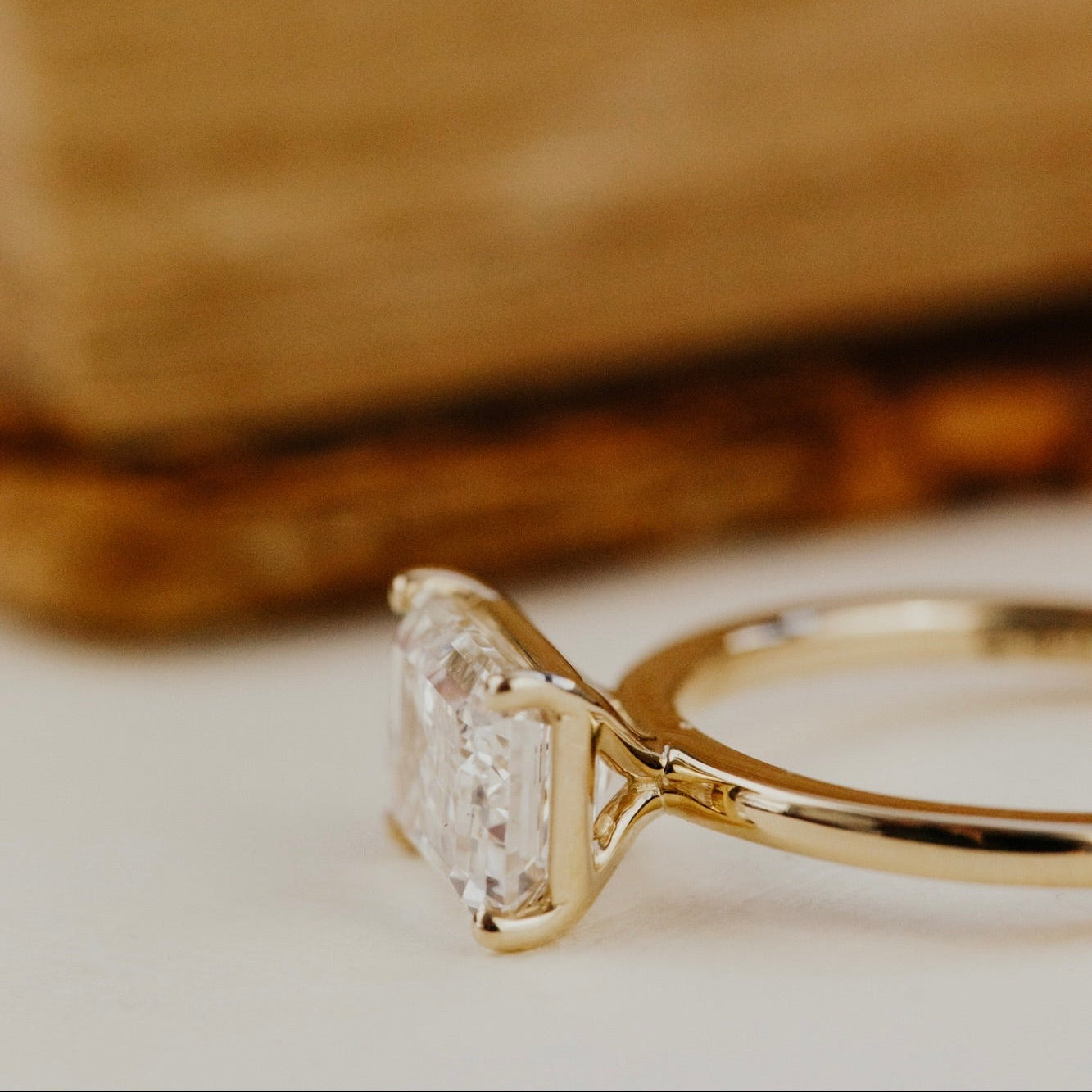 The Bennett 2.52 ct emerald cut lab grown diamond on a neutral background