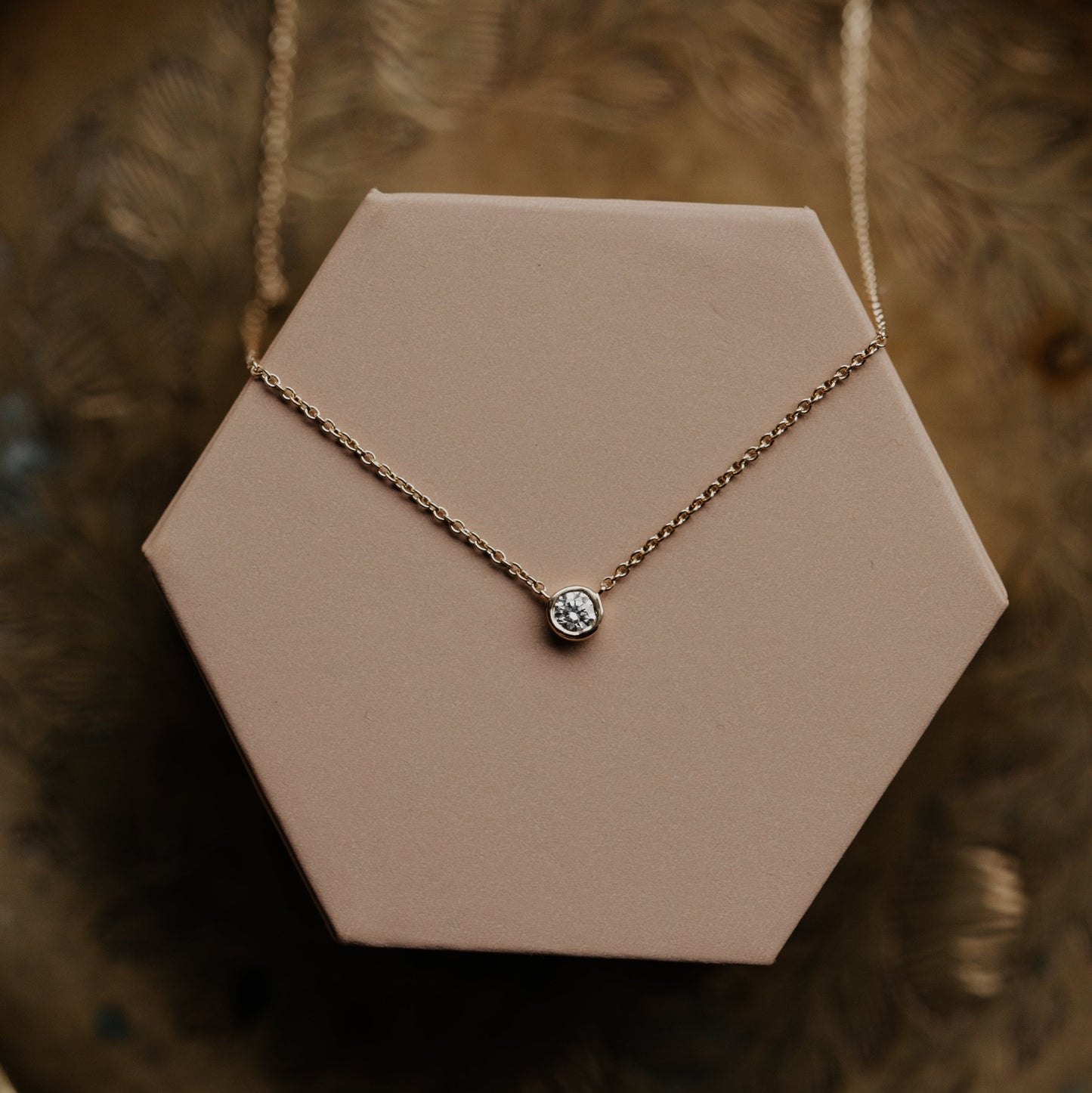 Bezel Set Diamond on Chain Necklace on a 14k yellow gold chain