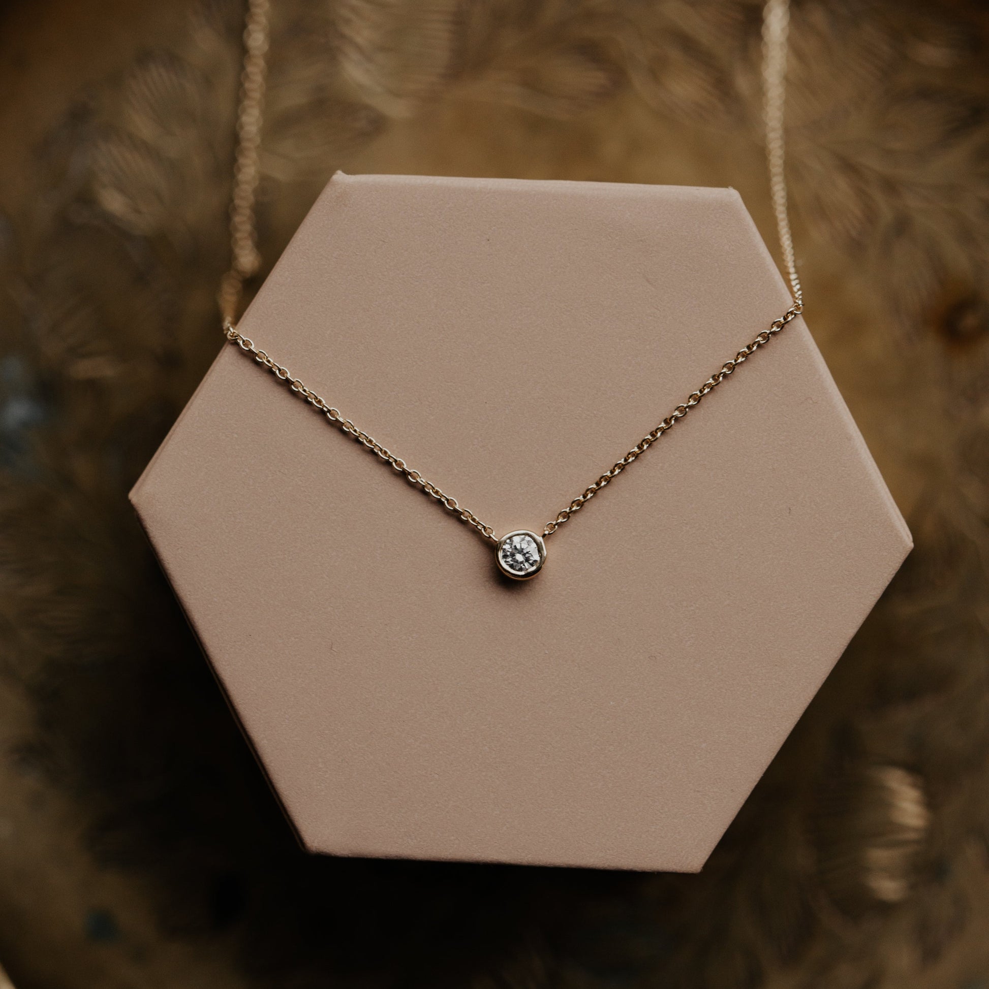 Bezel Set Diamond on Chain Necklace on a 14k yellow gold chain