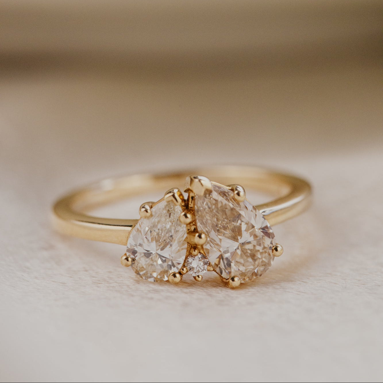 The Toi et Moi 1.00 ct Pear Champagne and .50 ct Pear White Diamond Ring