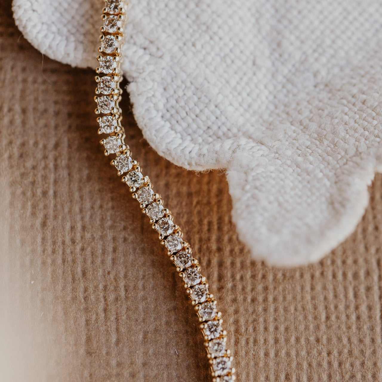 Detailed shot of the round diamonds in the Four Prong Round Diamond Tennis Necklace