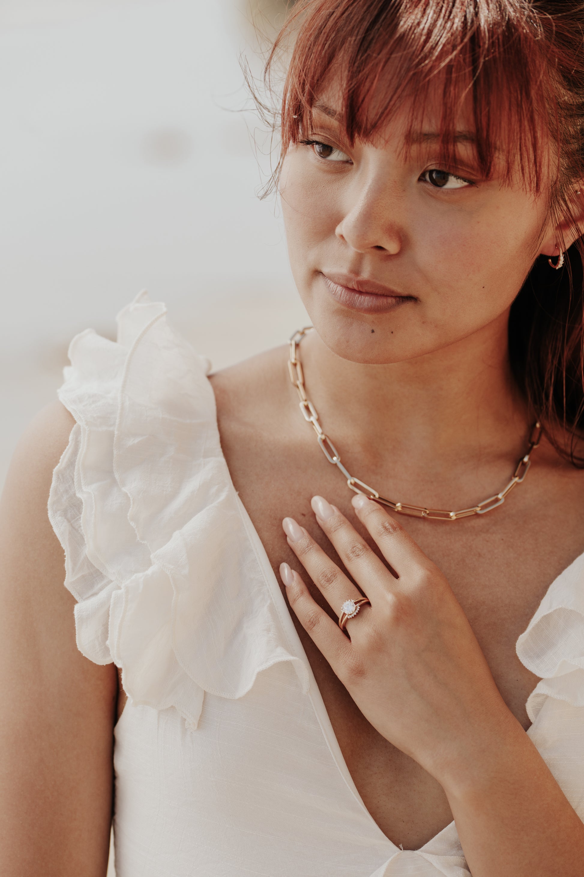 Large Paper Clip Chain Necklace 14kyg on a models neck