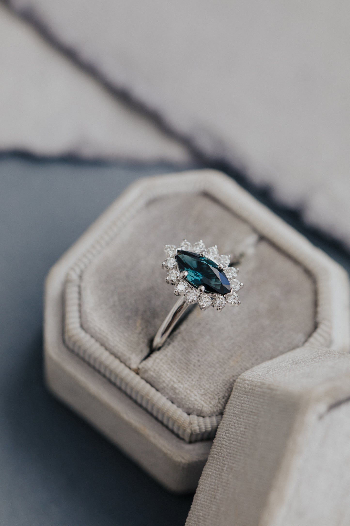 The Nova 1.09 ct Marquise Blue Sapphire Engagement Ring with a diamond halo