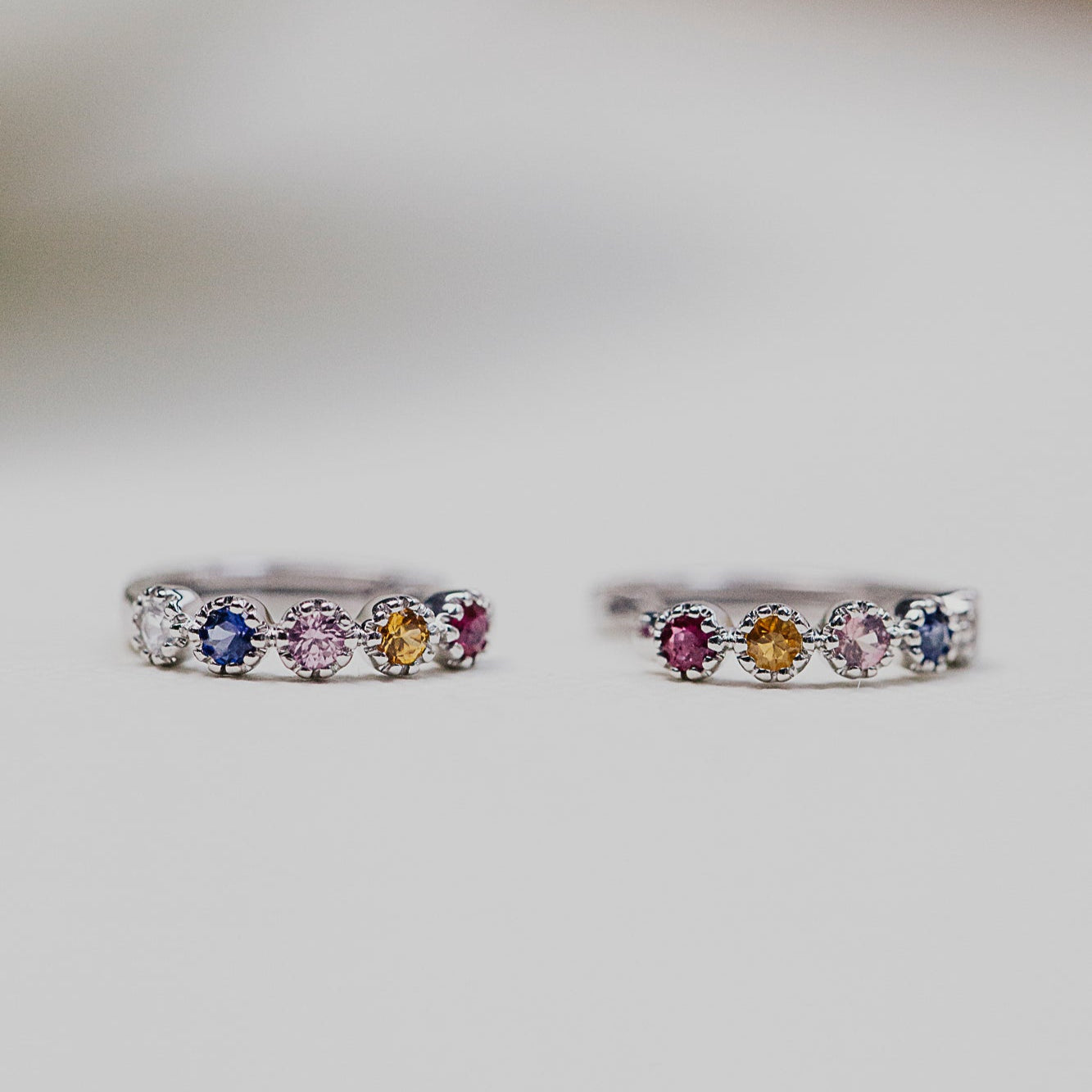 Rainbow .36 cttw Sapphire Huggie Earrings in 14k white gold