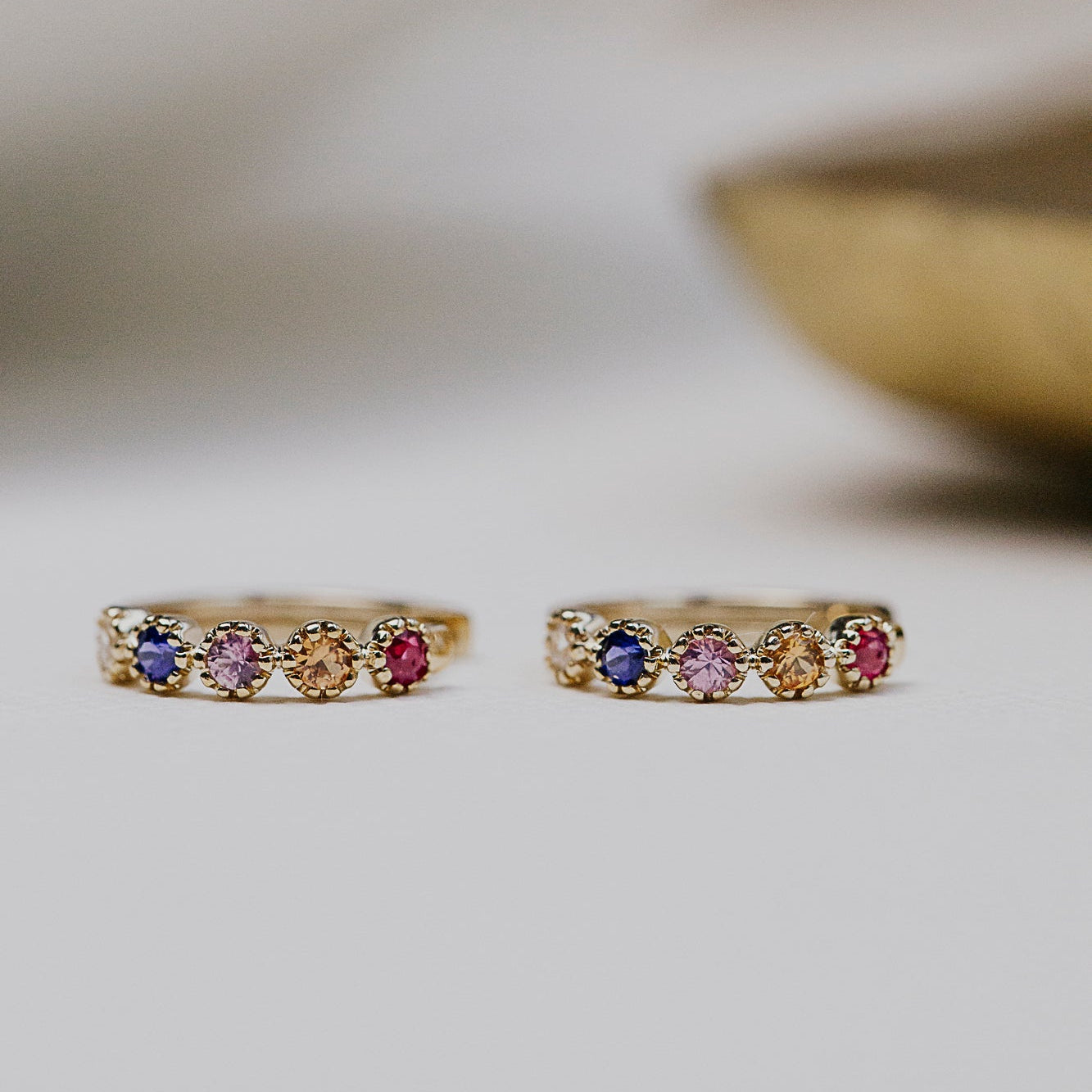 Rainbow .36 cttw Sapphire Huggie Earrings in 14k yellow gold