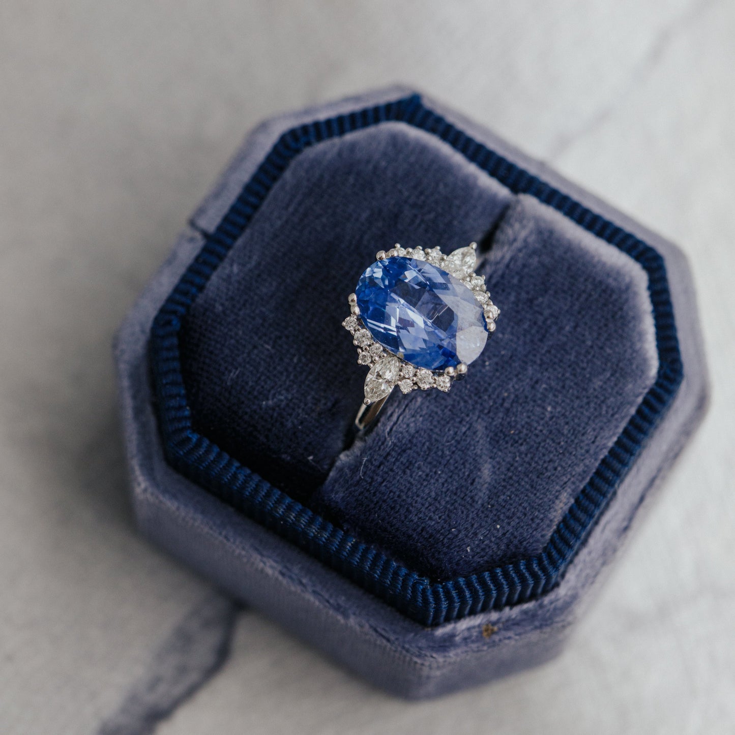 The Atlantis 2.86 ct Oval Blue Sapphire with .22 ct Side Stone Ring