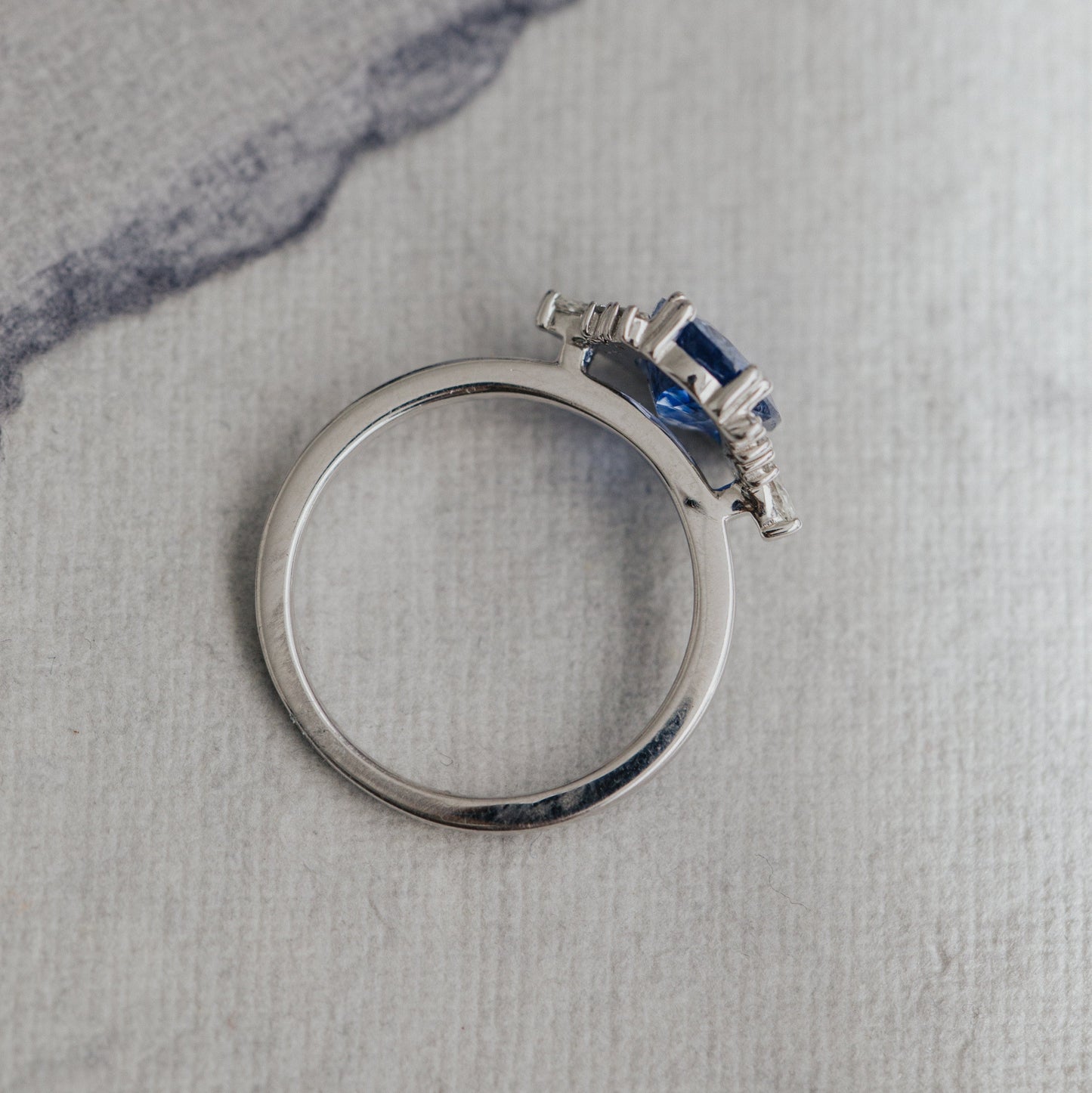 The Atlantis 2.86 ct Oval Blue Sapphire with .22 ct Side Stone Ring