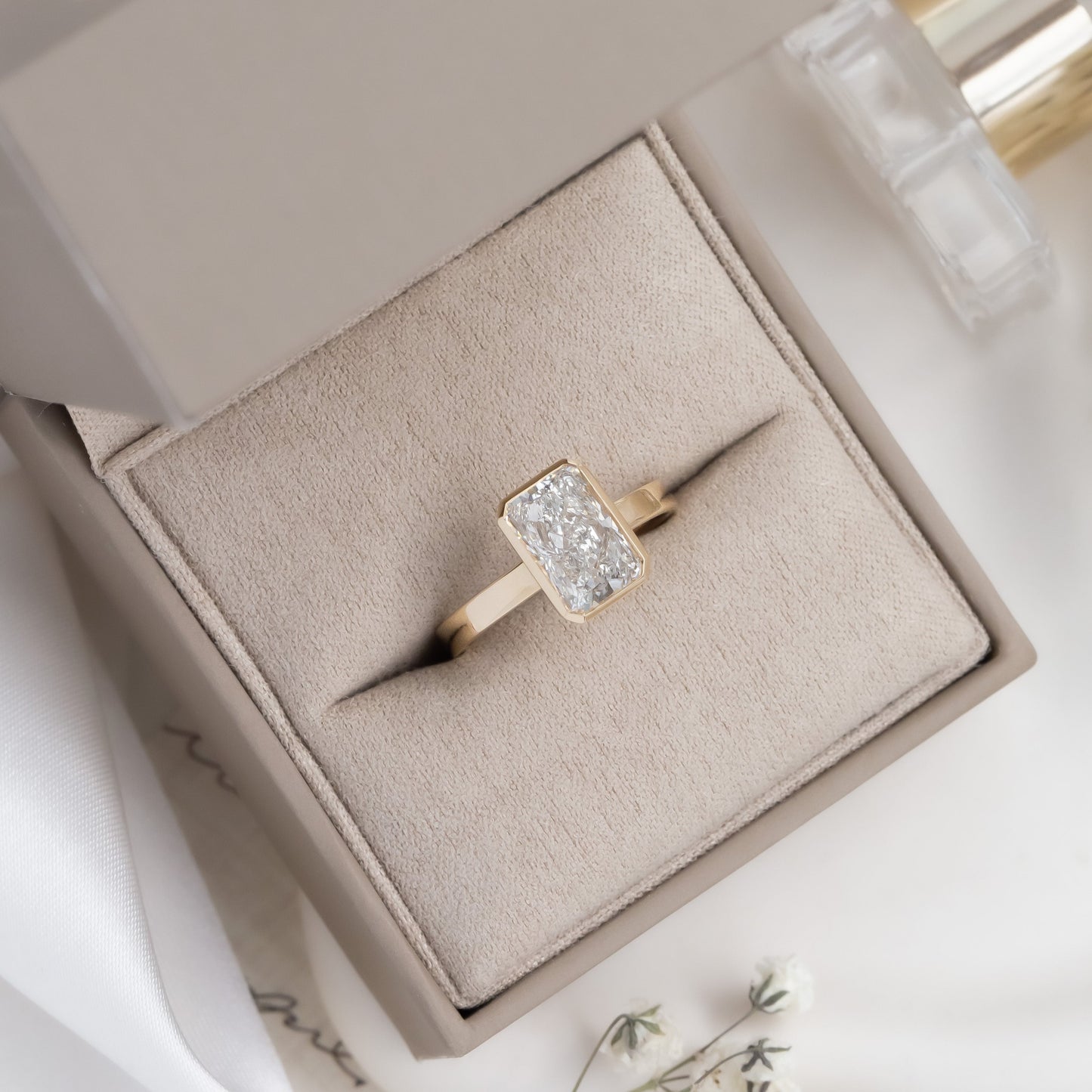 The Elena Radiant Cut Solitaire Ring in a Sarah O Jewelry ring box