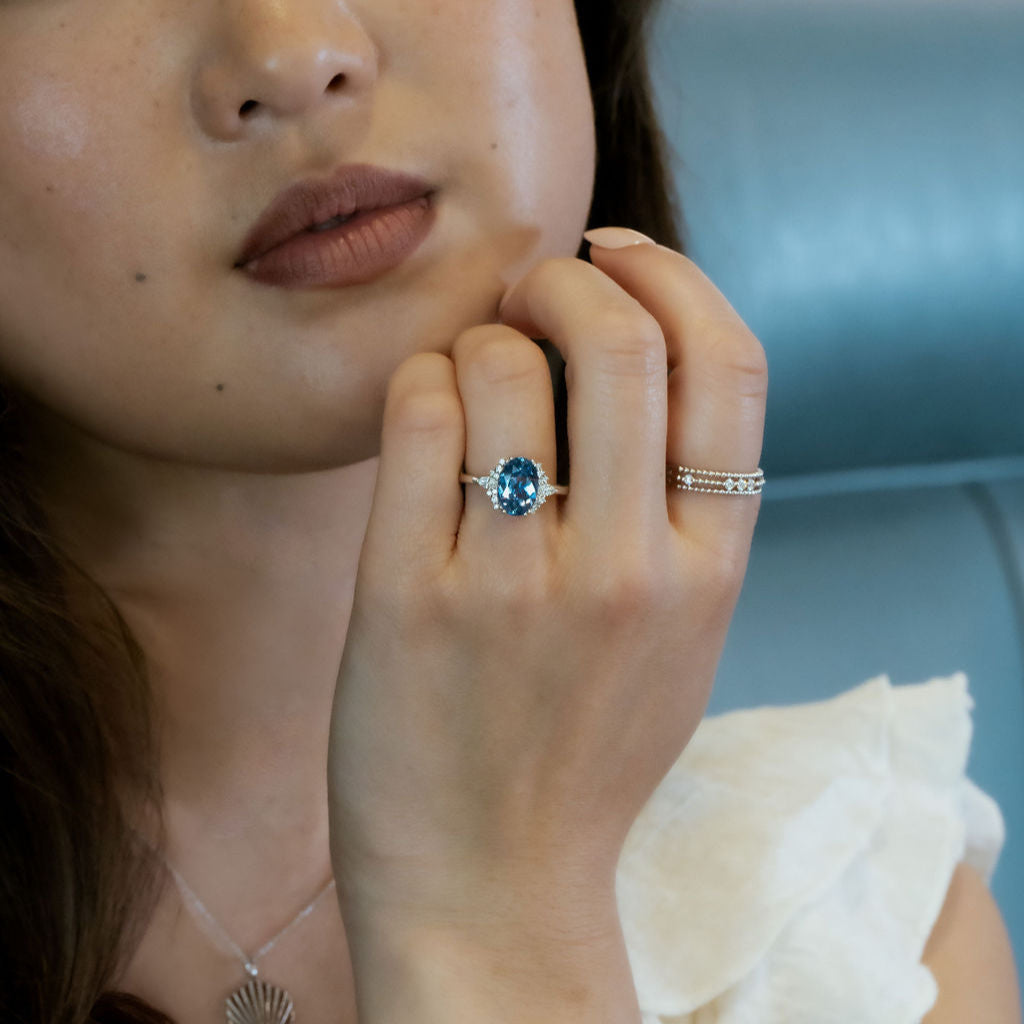 The Atlantis 2.86 ct Oval Blue Sapphire with .22 ct Side Stone Ring