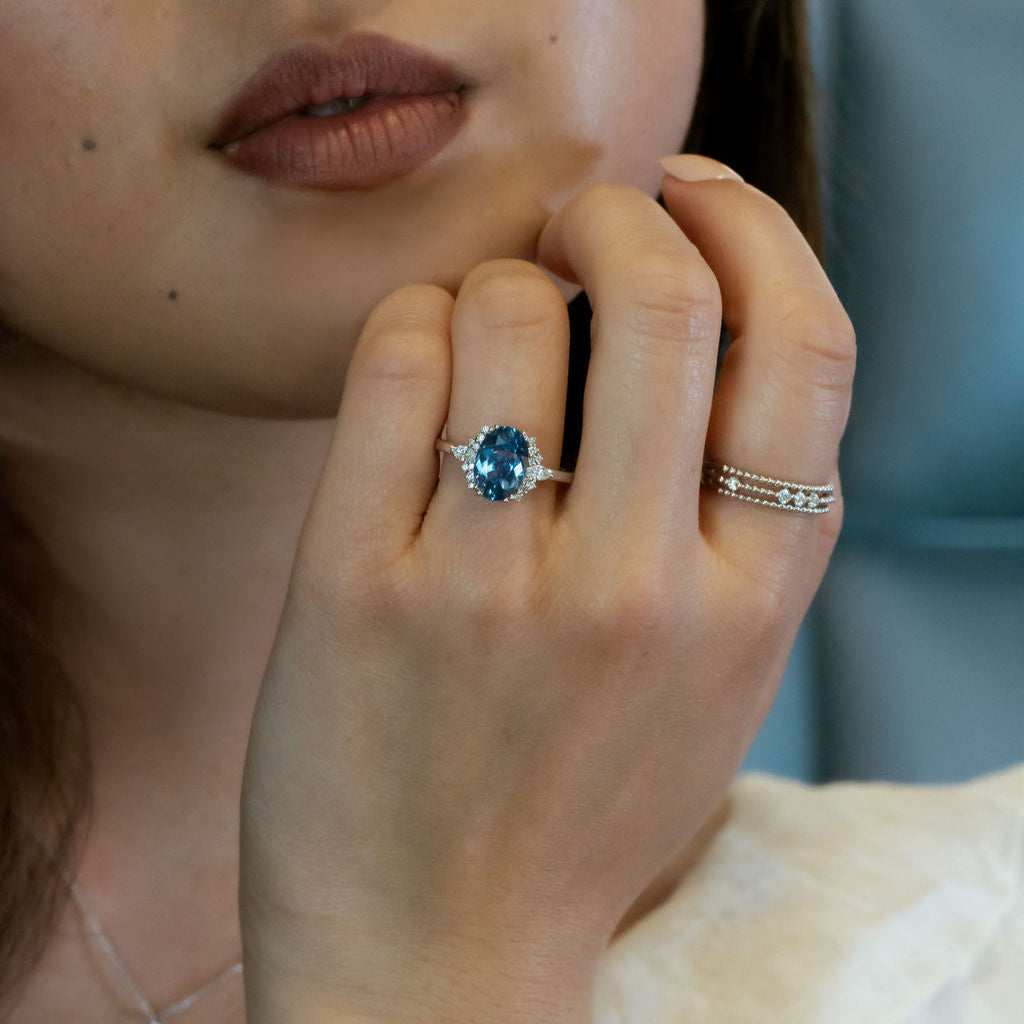 The Atlantis 2.86 ct Oval Blue Sapphire with .22 ct Side Stone Ring