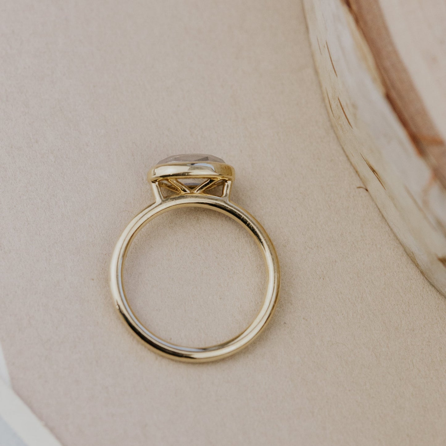 The Bennett 1.69 ct Oval Rustic Diamond Bezel Solitaire