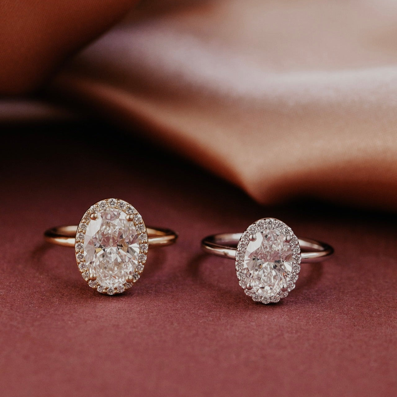 The Audrey oval diamond engagement ring with a diamond halo in 14k yellow and white gold