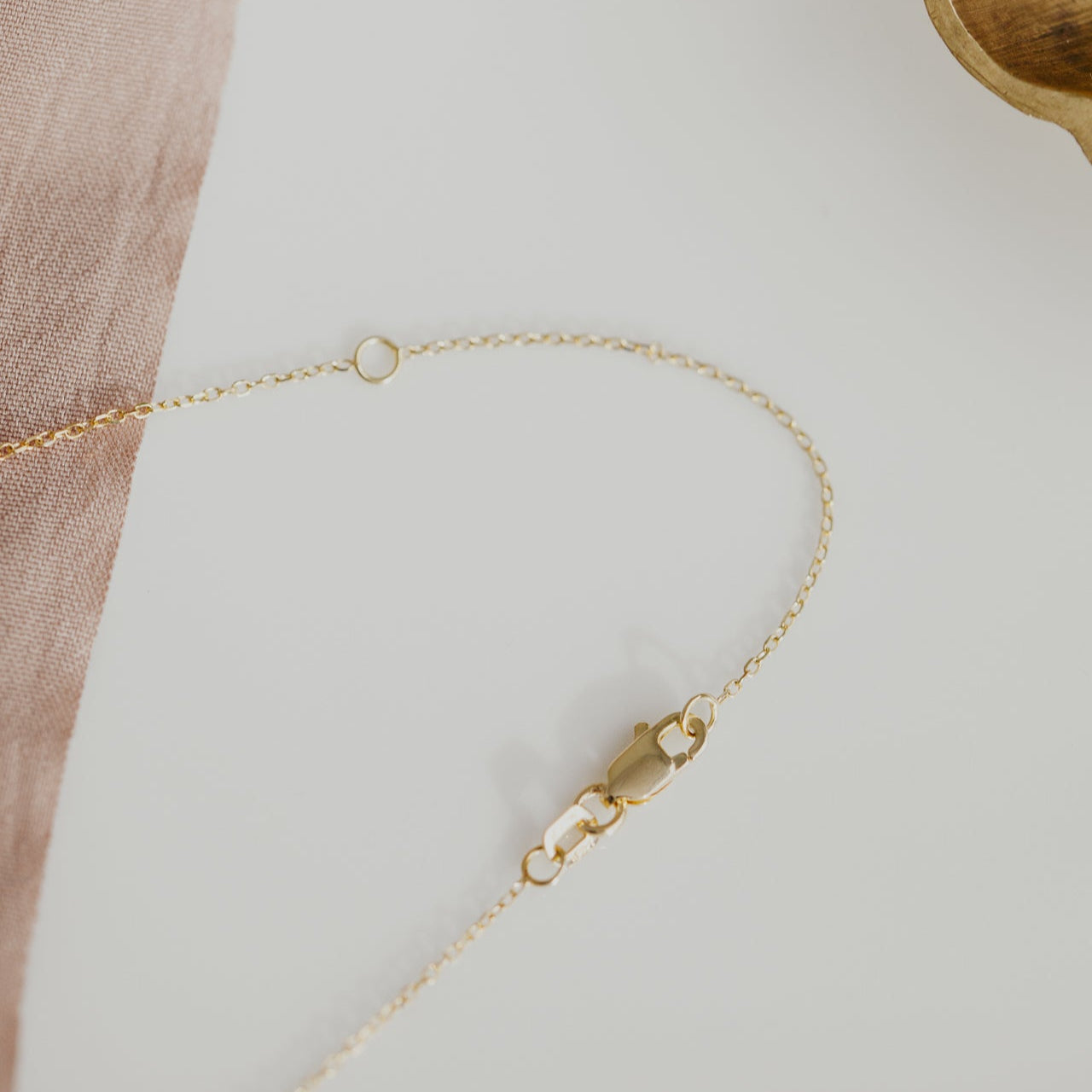 lobster clasp in 14k yellow gold