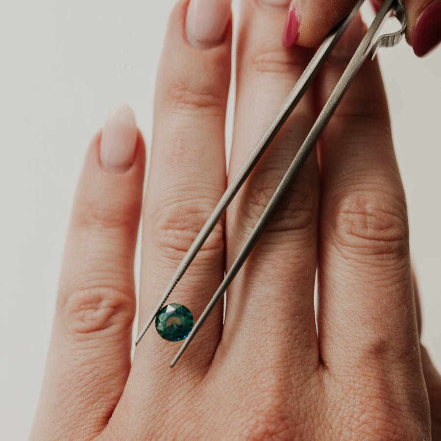2.01 ct Round Teal Sapphire Stone on Models hand