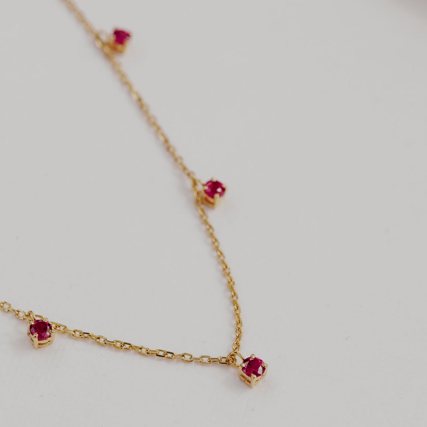 Seven Round Ruby Station Necklace